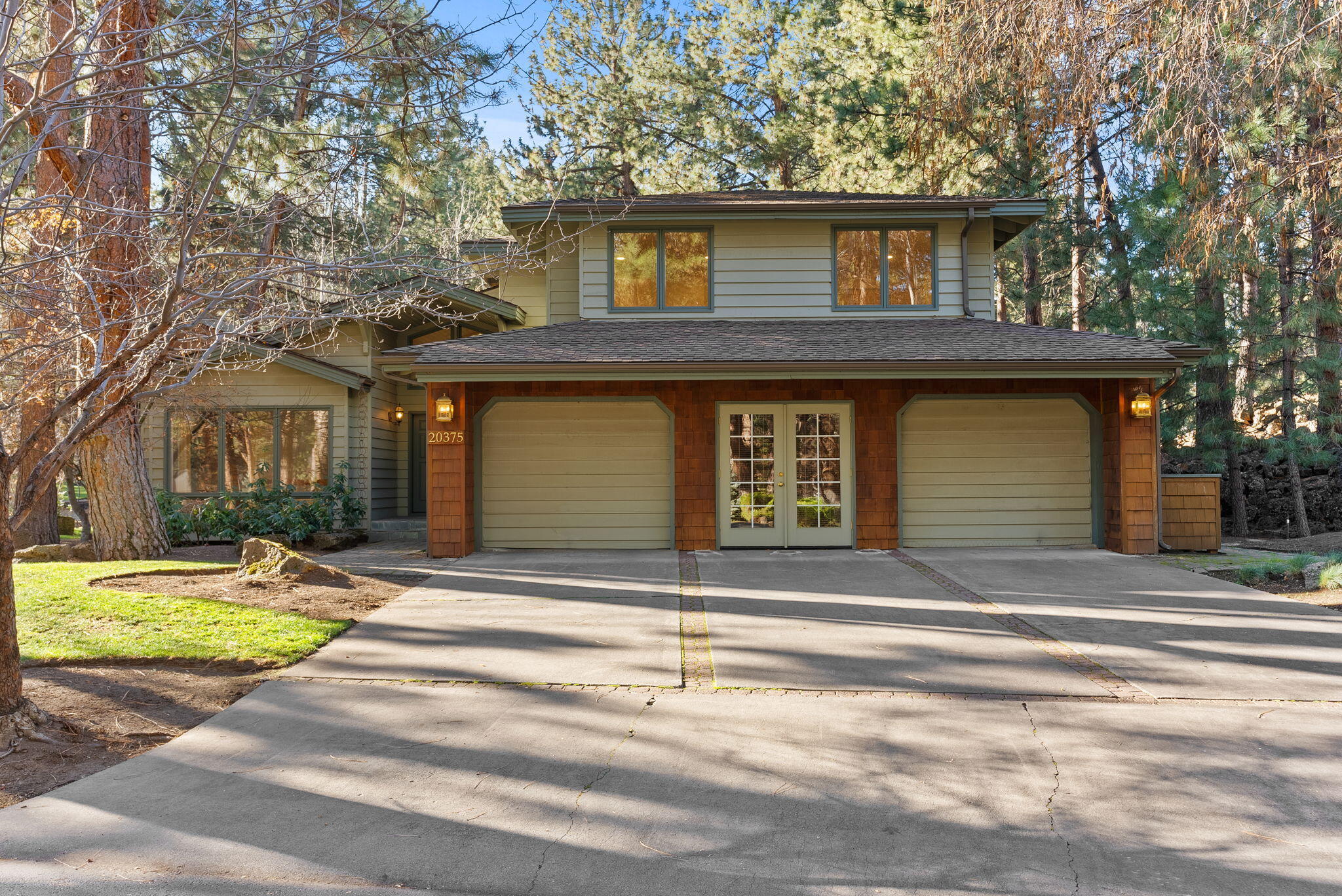 A distinctive home in Mountain High, this timeless gem has been freshly updated and is ready for its next chapter. The sunken formal living & family rooms add unique character to this efficient floorplan. The kitchen, with commercial refrigeration, is centrally located between the formal dining room, casual dining area, and cozy family room with a gas-assisted wood-burning fireplace. The main level also features a guest room or office, full bath, and an oversized laundry/craft room. Upstairs, a small loft/flex area is flanked by two spacious guest rooms, a private office/bonus room, and the primary suite with dual closets, a jetted tub, and a steam shower. The three-car garage features a centered man-door to enhance the exterior facade but could easily be converted to another garage door. Fresh  interior paint and custom LED lighting throughout completes this exceptional home.