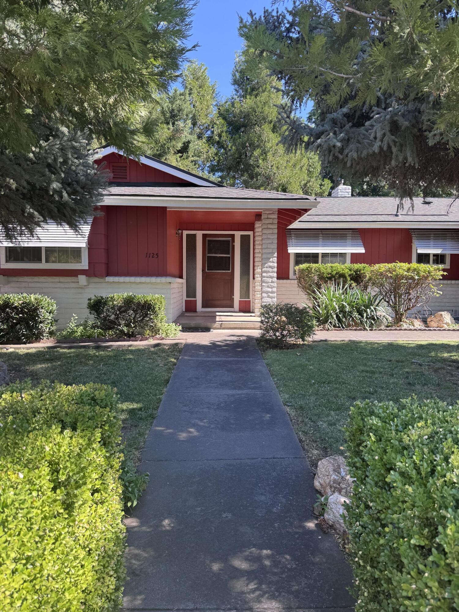 Newer exterior paint, new roof, engineered hardwood floors, Large kitchen/dining area.  Newer appliances, pantry, step down living room, with gas fireplace, gas water heater, double closets in both bedrooms Wonderful patio and yard with a garden shed.. Large RV parking with drain well for irrigation, large two car garage with utility sink.  Vinyl windows