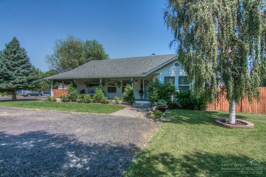 Gorgeous newly remodeled single level 2100+sf 3bd/2ba on beautifully landscaped 1/3 acres. Light and bright throughout with skylights and solar tubes, new vaulted master bedroom suite w/soaking tub, shower and huge walk-in closet. New Carrier heat pump, appliances included, private hot tub on patio, freshly painted exterior, underground sprinklers, fully fenced w/two storage sheds and RV parking. Close to schools and shopping, this is a MUST SEE for close in-town living with ample elbow room.