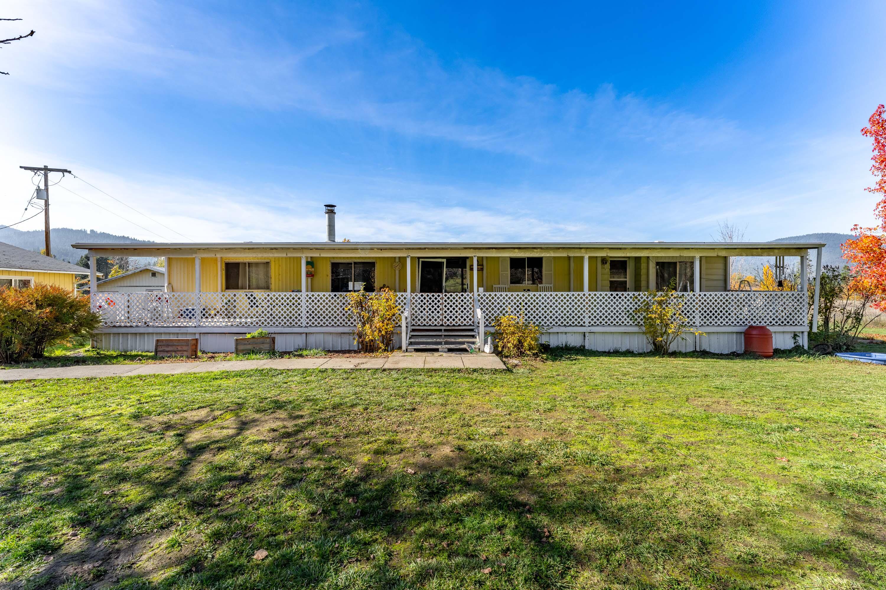 Experience the best of country living on 5.17 acres in Williams, OR! This spacious 3-bedroom, 2-bath home includes a private mother-in-law unit, perfect for extended family or rental income. Also 2 additional spaces perfect for an office or additional storage! Enjoy peaceful outdoor living with a serene pond and a versatile workshop ideal for hobbies, projects, or storage. With ample space for family, guests, and animals, this property offers flexibility and privacy while still being close to town amenities. Perfect for those seeking a rural lifestyle, multi-generational living, or a turnkey country retreat in a tranquil setting.