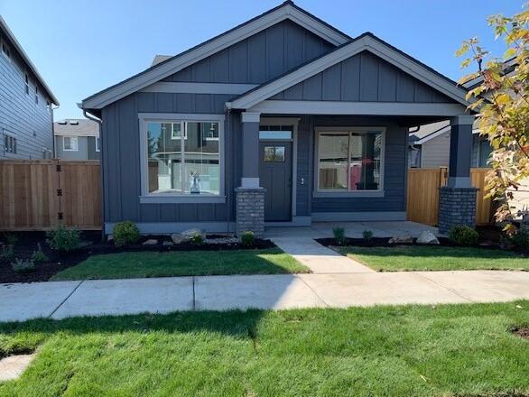 Buyer to receive $10,000 bonus for using preferred lender. See site agent for details. Popular, well-designed cottage-style home from an award-winning builder. The downstairs features an open great room with cozy gas fireplace, 1/2 bath, dining area, large kitchen with island eating bar, primary suite with walk-in-closet. Upstairs includes a large loft living area, with two bedrooms both having a small walk-in-closet, and a guest bathroom. Quality finishes include quartz countertops in kitchen  & baths, undermount sinks, engineered wood plank flooring in main downstairs living area & the baths/utility room, solid Alder cabinets, natural gas appliances, & Smart Home Technology. HOA includes front yard lawn maint. Amenities include a seasonal pool, Picnic Pavilion w/BBQ & eating area, parks, walking paths. Great location offering easy access to the RDM airport, Bend & other popular Central Oregon destinations. Photos of a similar home, specs vary. Model open for tours on Fri-Sat 12-5 pm.