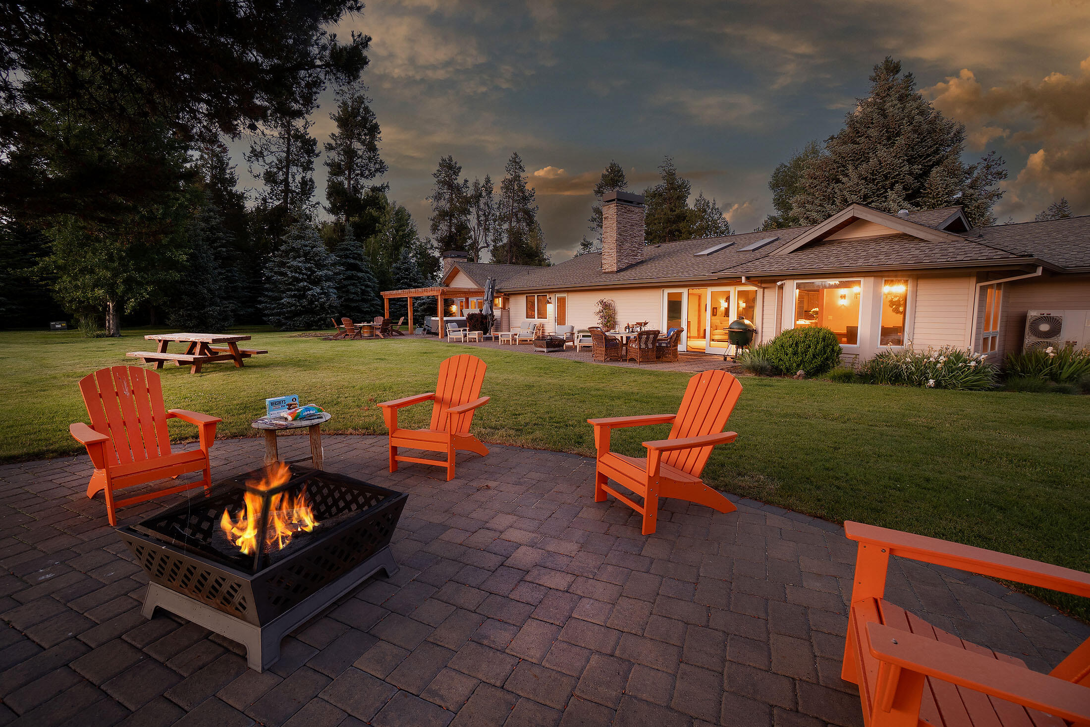 One-of-a-kind, secluded, SINGLE-LEVEL 3 bdrm/3 bath 3422 sqft home on 1.6+ acres w/snow-capped views of Mt Bachelor, Pistol & Bates buttes, w/protected, unobstructed 260' riverfront views up & down Big Deschutes! Coveted, private community-- only 7 homes in this over 30+ AC dvlpmt. Protected marshlands across the River preserve your views! Have a front row seat on the HUGE paver patio decks to see lots of wildlife & the Elk cross the river in winter! One look at this stunning home & mature garden offering the balance of adventure & tranquility, you'll know you're home!! Great Rm floor plan. 2 primaries, so mother-in-law or Jr. suite qtrs incl 1 HUGE ensuite! Detached Rec. Rm w/office in RV garage! Crown molding, Granite countertops, Jenn Air Refrig, Dacor cooktop,oven & warming drawer. Tile,Radiant flooring, Stacked Rock fireplaces, Daiken & heat pump/AC, water purification, whole house humidifier & central alarm systems. Heated driveway & epoxy garages & RV garage/Rec. Ctr.  No HOAs.