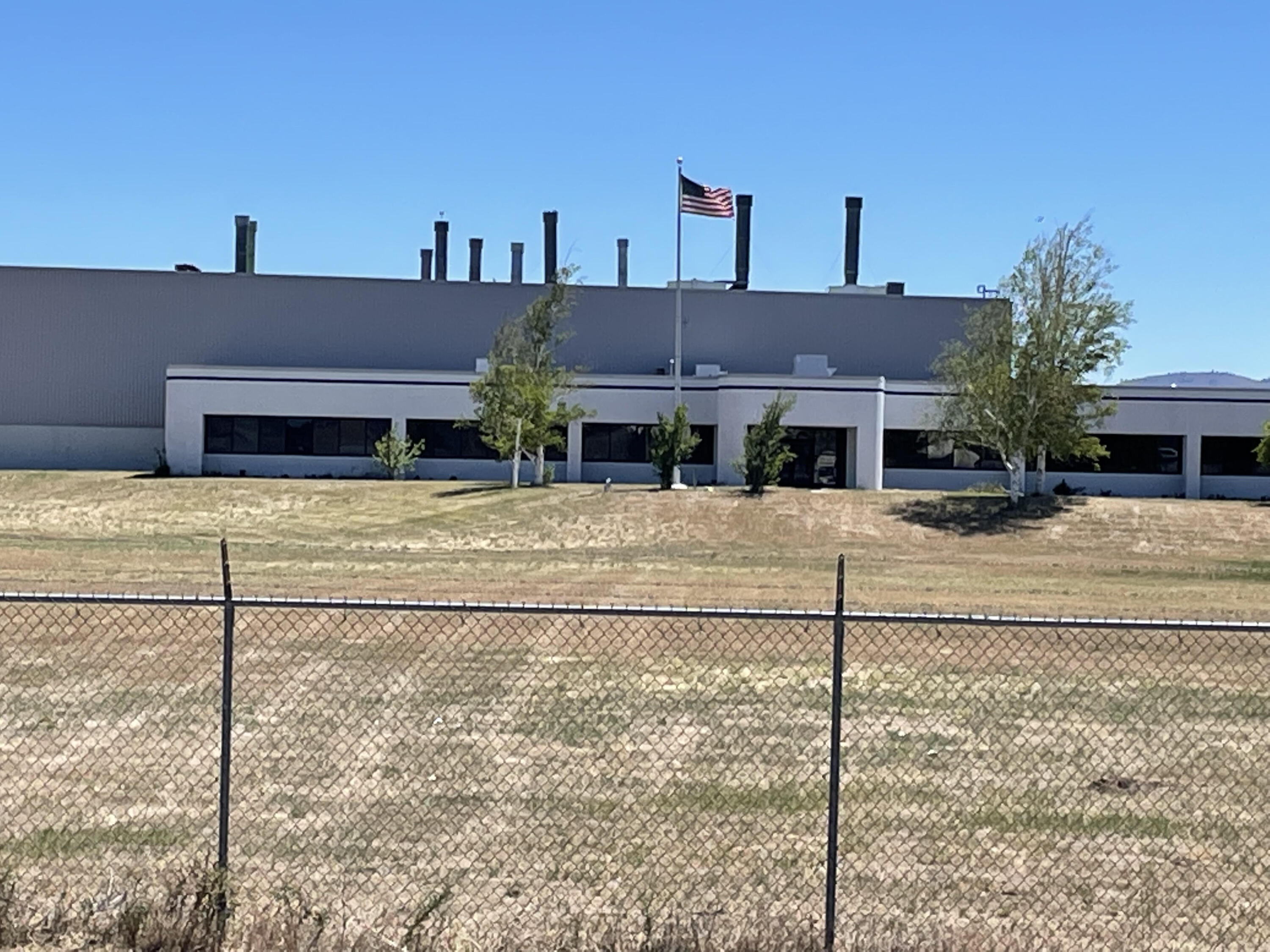 The Imerys property presents a tremendous opportunity for an industrial entrepreneur to build additional capacity and manufacturing and distribution activities from a very centralized Southern Oregon hub with arterial connections north, south, east and west. Forty-seven acres all fenced and secure. 200,000 sq ft of open span production area with 12,000 sq ft of climate-controlled office space. Enterprise Zone eligible. Access to BNSF and UP lines in Klamath Falls. Current processing operation uses less than 20% of the production and office space. Processing equipment and operational equipment all included with an accepted offer.