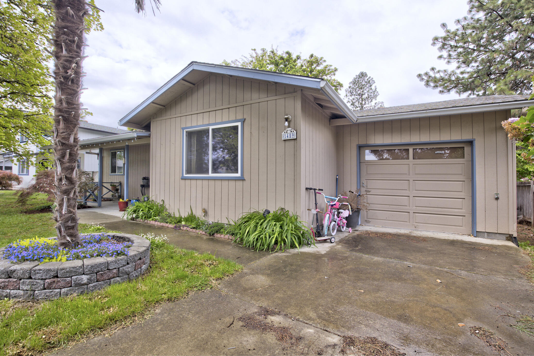 Here's the perfect opportunity to make your dream of home ownership a reality! Situated on a quiet cul-de-sac, this delightful home is 1,104 Sq. Ft. and features 2 Bedrooms, 2 Bathrooms, plus a bonus room with laundry/office setup. Kitchen, living and dining rooms are open concept and have updated flooring and paint. The .19-acre lot is spacious, with mature landscaping, a covered back patio for gathering & entertaining, as well as front porch to enjoy the warm summer nights. There's plenty of space for a garden or add an above ground pool and enjoy swimming under your own palm tree! Close to city services, District 7 schools, shopping, downtown and Reinhart Park, you'll have everything you need just minutes away! Make your appointment to view today!