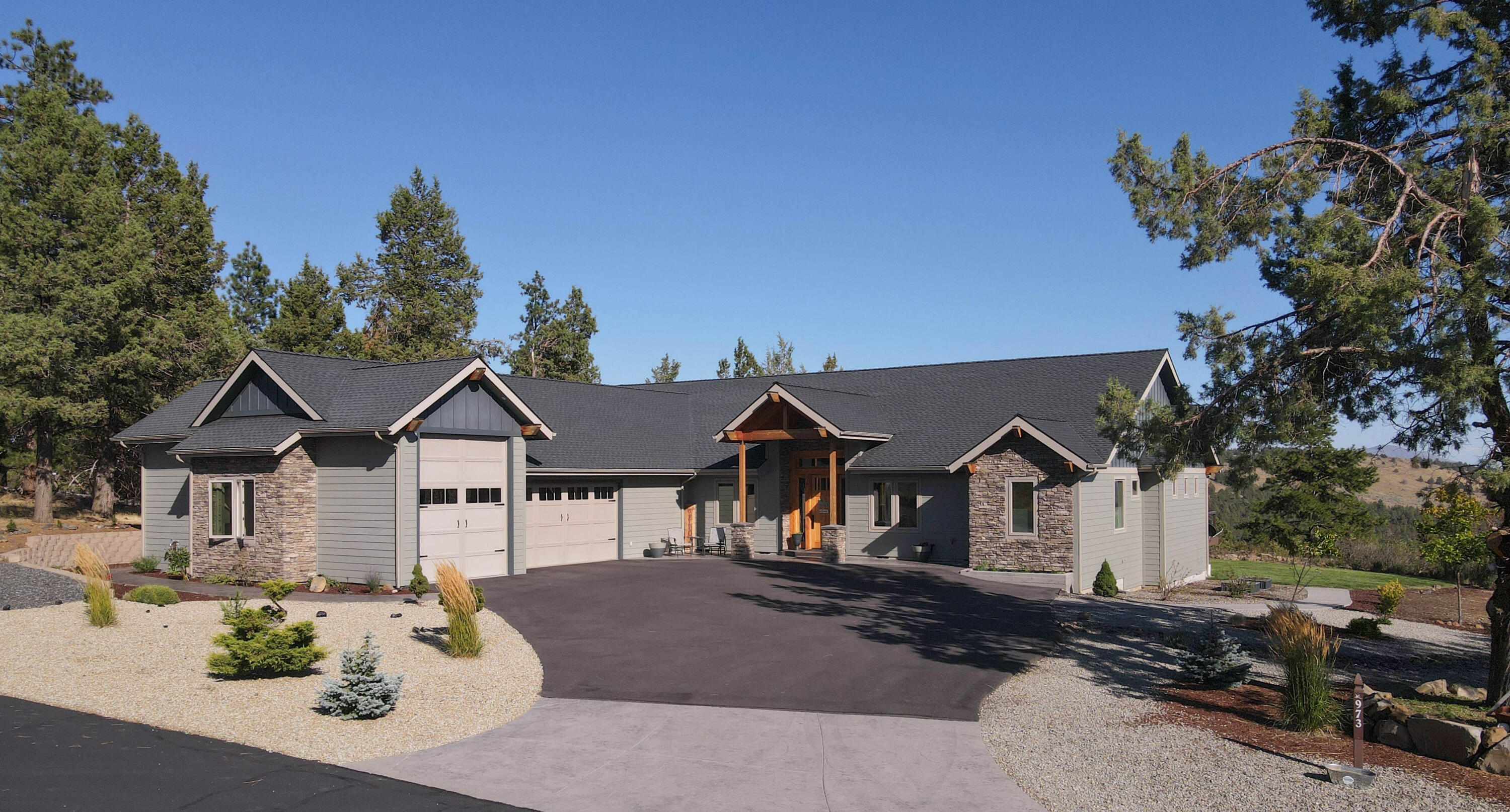Gorgeous 1 level custom home in the gated subdivision of RidgeWater Properties in sunny Southern Oregon! Rarely do homes come available in this sought after community. The home features a Southeastern seemingly endless view of the Klamath Basin, mountains & Klamath River. Enjoy your pool & cabana while taking in the scenery. Situated in the pines, the Northwest style home also has an attached RV garage, a circular driveway, low maintenance landscaping & is backed up to greenspace, so no one can ever block your view. The kitchen suite has a Viking Range, hand pounded brass range hood, soft close drawers, custom cabinetry, a very large workspace island & large pantry. Two dining areas, with ample room for large parties, office, open floor plan, custom built-ins & very large windows to allow natural light & unparallel wildlife & birding. All bedrooms are en suite & the primary has a heated floor. Do not miss this opportunity. Minutes from downtown, Sky Lakes Medical Center & OIT.