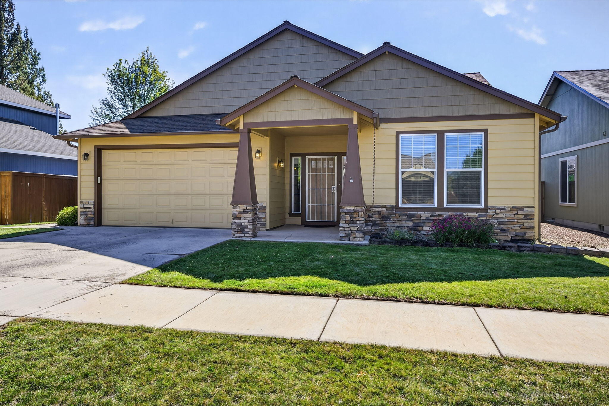 Charming single-level home in Cooper Springs neighborhood. This inviting residence offers a tile entry way, an open floor plan featuring a stone gas fireplace and durable LVP flooring throughout much of the living space. The primary ensuite has a slider leading to the backyard and is thoughtfully separated from the additional bedrooms for added privacy. The kitchen includes stainless steel appliances and a convenient center island. Enjoy a nicely sized fenced backyard with a stained, stamped-concrete patio, arbor, and a 10x10 storage shed. Ideally located near parks and Jewell Elementary.