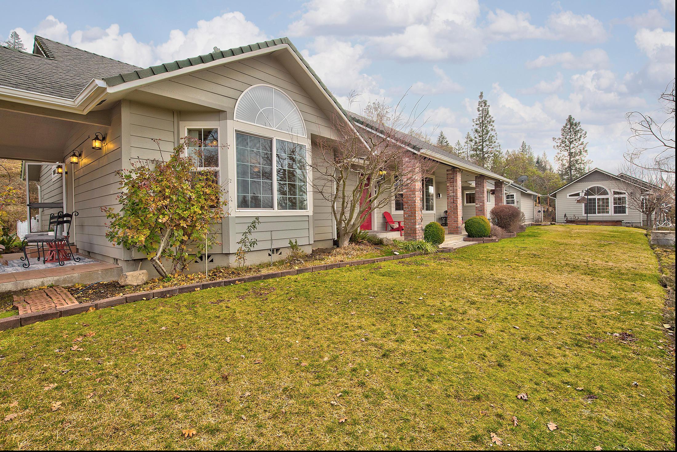Custom home on 5+ acres in the sought after Murphy area. Views, Big shop,Studio/guest quarters, barn and more! The 3511 sq ft, 4 bed, 3.25 bath home features vaulted ceilings, hardwood floors, large open living area and gorgeous views! Kitchen for entertaining with large island, granite tile countertops, 2 wall ovens, Butlers Pantry, 5 burner gas cook top, huge pantry, breakfast nook & formal dining rm with built in hutch. The master suite features large windows, French door to its own patio, dual sinks & walk in closet. Even the laundry room is fabulous with lots of storage and craft counter! 3 of the bathrooms are remodeled with heated floors! The Studio building (798sq ft) could be an office, recreation or guest qtrs. The garage is oversized! The shop w/ power) is 30 x 40. The pole barn is 32 x 24. Other exterior feat include 2 high prod wells, covered RV port w/hook ups, 2 other outbuilding. Irrigation rights per seller. Buyers to their own diligence on subject property.