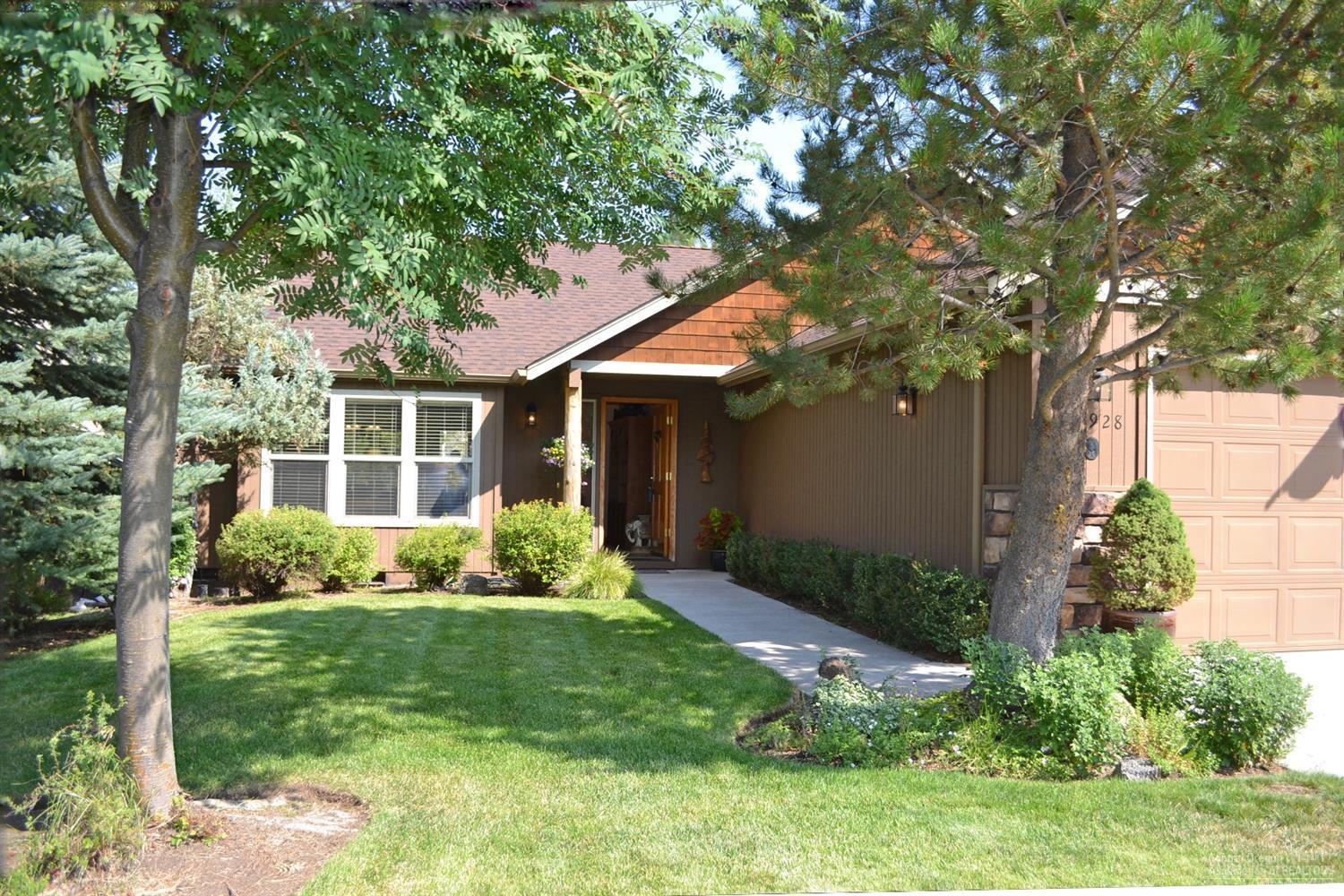 You'll fall in love with this single level charmer when you pull up to the home. Vaulted ceiling & gas fireplace w/elegant stone surround in living room. Master bedroom boasts vaulted ceilings, walk-in closet & slider to spacious, 400 sq.ft. elevated back deck that you'll love to entertain on! Utility room with plenty of built-in cabinetry. 2 car garage w/remotes & workbench. Beautiful, mature landscaping w/auto sprinklers & large fenced back yard area. Gutters, A/C, gas appliances, storage shed.