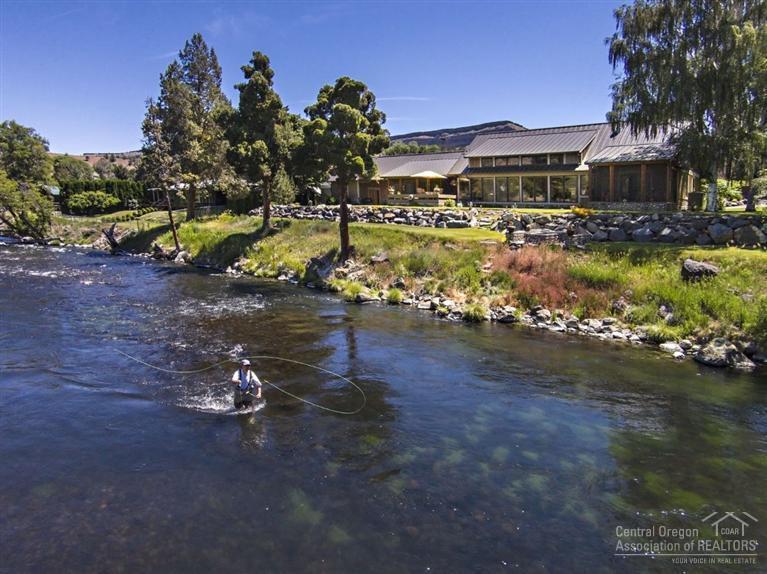 Lower Deschutes Riverhouse is nestled on the bank of one of the most incredibly diverse fishing rivers. Custom single level home: 2402 sf 3 bed, 3 bath, hardwood & tile floors, gourmet kitchen, granite countertops, office, & 2 screened porches. Shop: 1600 sf, RV parking, finished guest quarters/bonus room. Property is .63 acres w/ 200 ft of easily accessible private river frontage, landscaped with outdoor living spaces for entertaining Scenic Deschutes River Canyon.