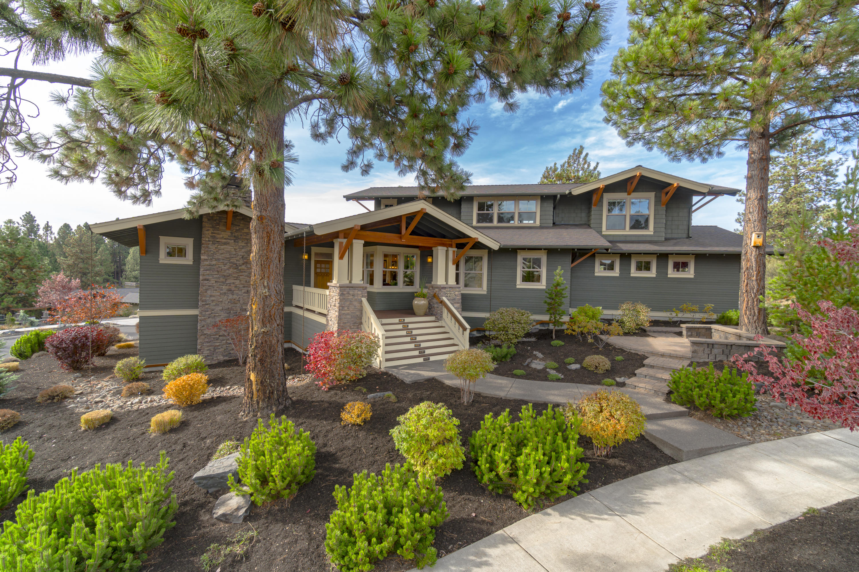 Custom-built and designed by one of Northwest Crossing's premier builders, Greg Welch. Impeccable quality throughout, this Craftsman influenced home is located on one of the most desired corner lots in the neighborhood. Sophisticated great room floor plan features dry stack stone fireplace, chef's kitchen perfect for entertaining, main level master, dedicated office, private main level en suite bedroom, plus expansive covered decks overlooking beautifully landscaped, low maintenance yard. Upstairs is en suite bedroom, a loft/study space with built-ins and large bonus room over garage with bar sink area perfect as an artist's studio, family room or fitness space. You'll appreciate the unrivaled conveniences of nearby West Bend Trail, Compass Park, schools, Northwest Crossing village shops and restaurants, and the popular Galveston corridor making this property one to live your best life possible in Bend.
