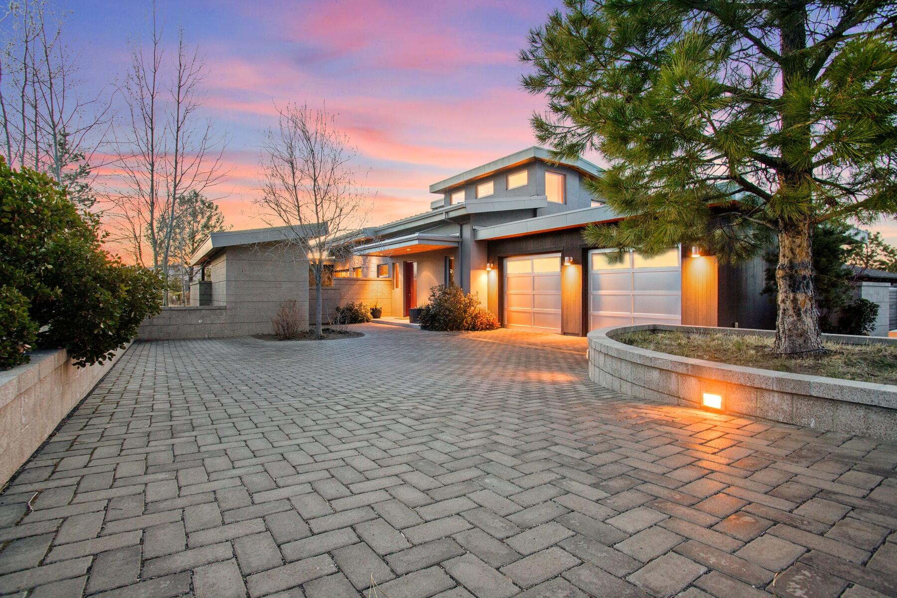 Clean, modern styling and solid, enduring ICF construction in a welcoming Shevlin Commons home, and the National Forest beyond, this property seamlessly delivers a sense of peace and seclusion without sacrificing comfort and convenience. Ecologically friendly in setting, construction, and design, this soundly built home offers both active and passive solar, radiant floor heating, clean contemporary lines, a sunny southern courtyard, and a mix of natural materials including cork, concrete, and hard woods. Functional spaces create ample room to spread out, with a home office, den, mudroom, 900 square foot basement bonus space, and the option for main living on a single level, if preferred. Expansive Cascade Mountain and terrain views can be appreciated from multiple rooms and patios. Less than half a mile from the Shevlin Commons Trailhead, access to walking, hiking, and biking is right out your front door, and the community clubhouse, lawn, and water feature are just steps away.