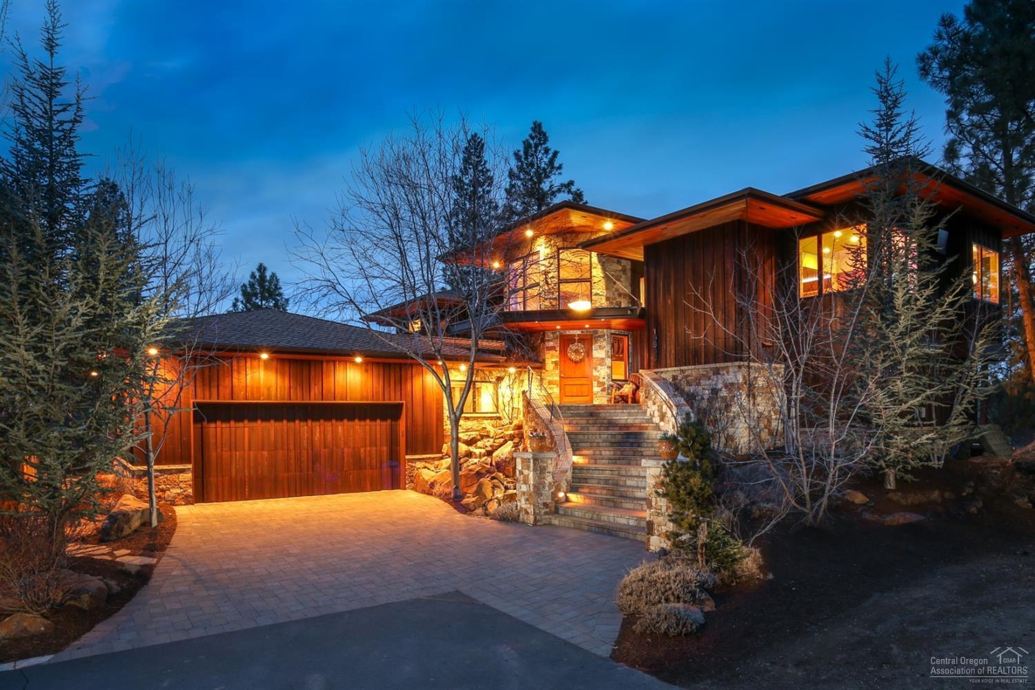 Exquisite craftsmanship is evident throughout this Gary Norman built home with views of Mt. Bachelor, Broken Top, the river canyon, and the Deschutes River below. This exceptional design highlights clean lines and perfectly placed windows for privacy & flooding the home with natural light. The chef of the family will appreciate the high-end appliance package including a Sub Zero walk in refrigerator & freezer, pull out Sub Zero refrigerator & freezer drawers in the cabinets, Viking range with double ovens, hood, and dishwasher. The butler''s pantry includes an additional Miele dishwasher, built in espresso machine, and steam oven. Teak cabinetry, granite counter tops, & built in breakfast nook complete the package. The great room/dining room includes floor to ceiling windows, eleven foot ceilings, custom LED lighting, stone fireplace with gas insert, and double sliding doors opening to the covered deck with built in heaters on the ceiling, see through railing, and an outdoor kitchen.