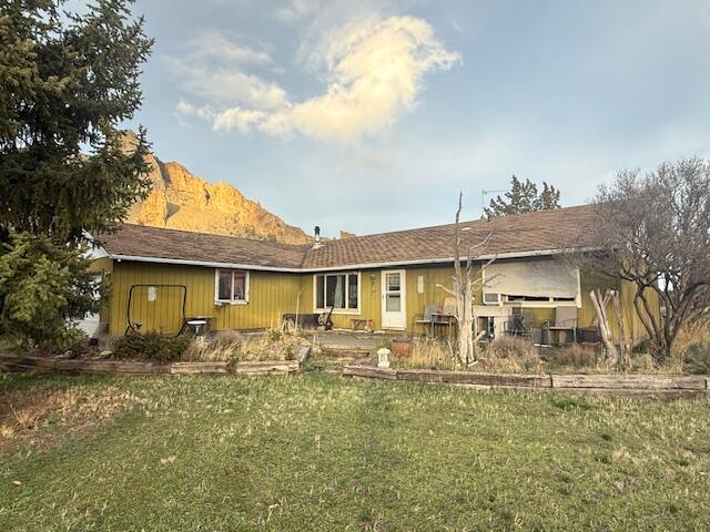 Location, Location!!! Epic views of the Cascades & Smith Rock on two sides, this home needs someone to make it shine. 1680 sf home on 2.59 flat acres of Central Oregon paradise. 3 bedrooms, 2.5 baths w/newer kitchen cabinets & appliances. Double garage, space for a shop. COID water rights & a private well. Cash only; sold as-is, no repairs or credits.