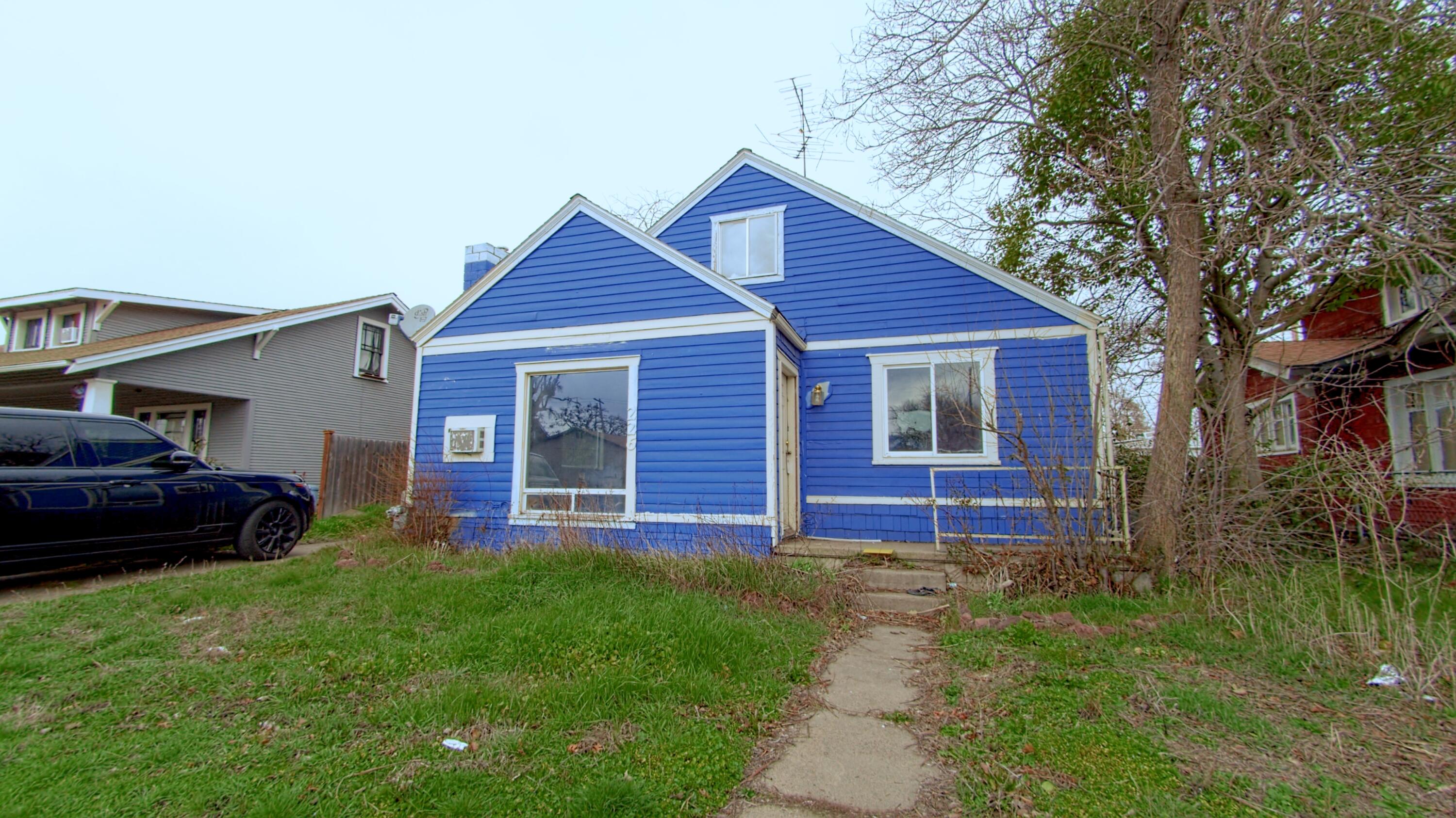Investor Alert! This property is located in a good neighborhood and offers 2 separate units. The property is in need of some TLC, making it the perfect fixer upper for the right buyer. Unit 1 features 2 bedrooms and 1  bathroom and has 1,403 sq ft of living space. The unit also features a second floor space, accessible by stairs located at the back of home which could be used as an art studio or office. Unit 2 is a 1 bedroom 1 bathroom detached home that has 618 sq ft of living space and also features alley access. 
Both units have great potential with their desirable features such as hardwood floors, fireplace, and large windows. 
The property is situated close to nearby amenities such as shopping centers, schools, parks, etc. Don't miss this opportunity to own this fixer upper property with 2 separate units. With a little bit of vision and some hard work, this property has the potential to be an amazing investment!