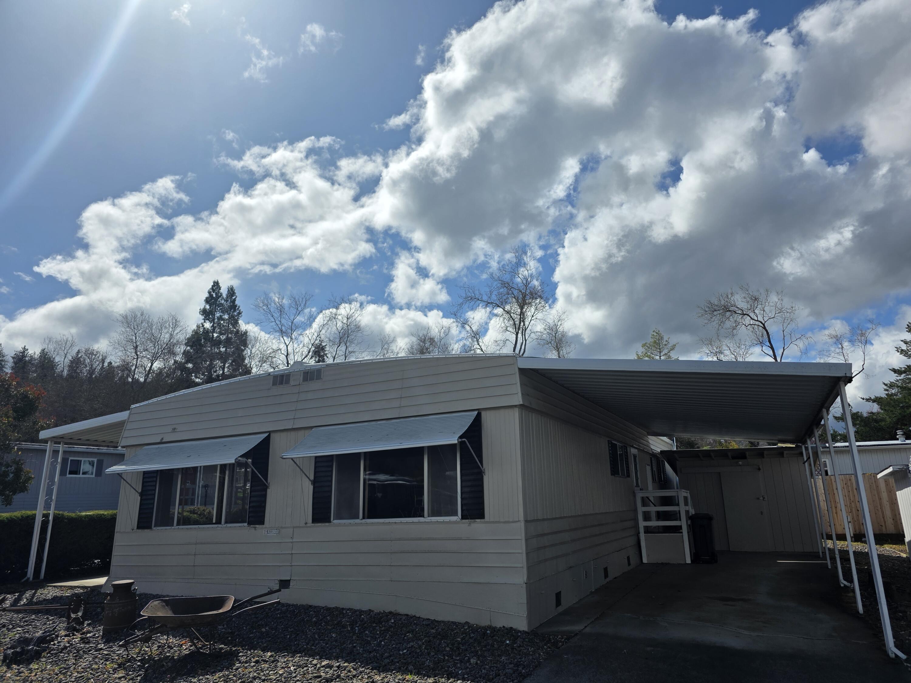 Great location, just outside of Jacksonville! This cozy manufactured home is just a 3-minute drive to historic Jacksonville! Offering comfort & convenience, this home has been thoughtfully updated with brand new flooring throughout, fresh exterior paint, a new hot water heater in 2023, and a membrane roof installed in 2022. Located in a vibrant 55+ community, you'll enjoy access to a well-equipped clubhouse, lovely community areas, and a fantastic outdoor pool. With a prime location and all these features, this home is priced to move.