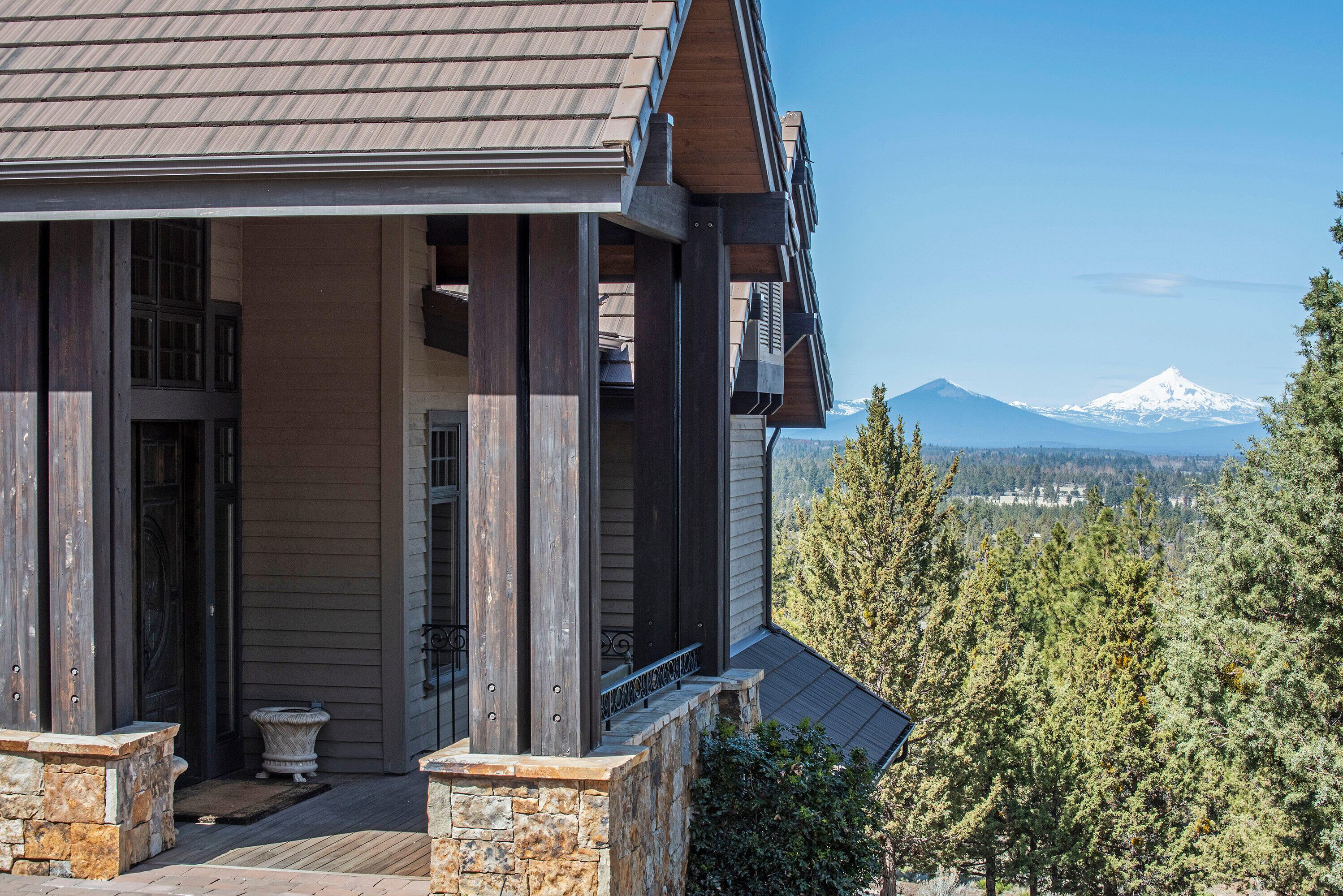 This majestic, timeless home on over an acre features panoramic views of the Cascades. Located in the prestigious North Rim neighborhood, (adjacent acre+ lot available) this home boasts over 6600 square feet, and has many luxurious amenities. 
One of a kind, main level master suite with imported marble, copper tub, mountain views and 2 spacious walk in closets.
3 additional, beautifully appointed en suite bedrooms, theater room, bar with wine cellar. 60 inch Wolf range, wool carpets, heated driveway, covered outdoor living spaces with mahogany deck.
This property is built to host your friends and family year-round.  
Offered beautifully appointed with high end furnishings.