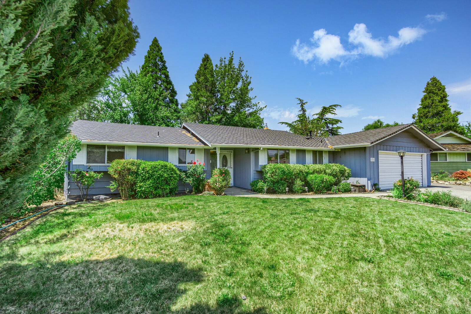 Excellent East Medford location. Easy access to everything you need!!! 3 bedrooms and 2 large bathrooms with a HUGE, almost one third of an acre lot in East Medford. Same owners for approx. 40 years! Great bones, well-maintained and ready for your modern updating. Roomy floorplan, highly coveted, single level home. Plenty of room for each person to have their own space. Newer roof, external paint and H2O heater. Trane HVAC about 2 years old! Big garage with work bench, overheard storage and cabinets. Enormous backyard ready for your imagination. This home has so much room! Stacker washer/dryer, fridge included in sale. If multiple offers, then all offers due by 6pm Saturday, June 26. Information deemed reliable but not guaranteed, Buyer to do all due diligence including respective schools, home specifications such as but not limited to square footage and bedroom count.