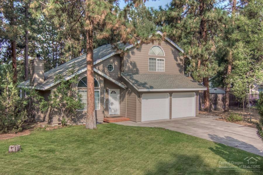 Newly remodeled home on a large, well treed lot in SW Bend. Wide plank pine hardwoods cover most of the main level. The living and dining room open to the second floor. Open concept from the beautifully done kitchen to the family room beyond. Slab granite counter tops in the kitchen and all bathrooms. Small office and all bedrooms are upstairs and have a treehouse feel as you look out to the pine trees in this neighborhood. Fenced back yard and RV parking, too! Come see for yourself! Move in ready!