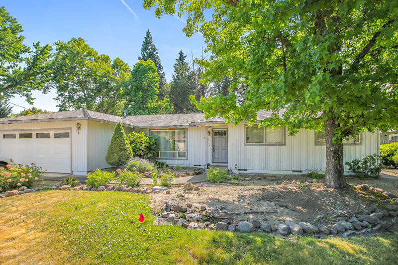 Lovely East Medford home in desirable neighborhood. Fantastic floorplan with formal living room and cozy family room with fireplace. Bring your green thumb and return the huge backyard to it's former glory. Covered deck is perfect for entertaining. Close proximity to I-5, medical services, schools and shopping.