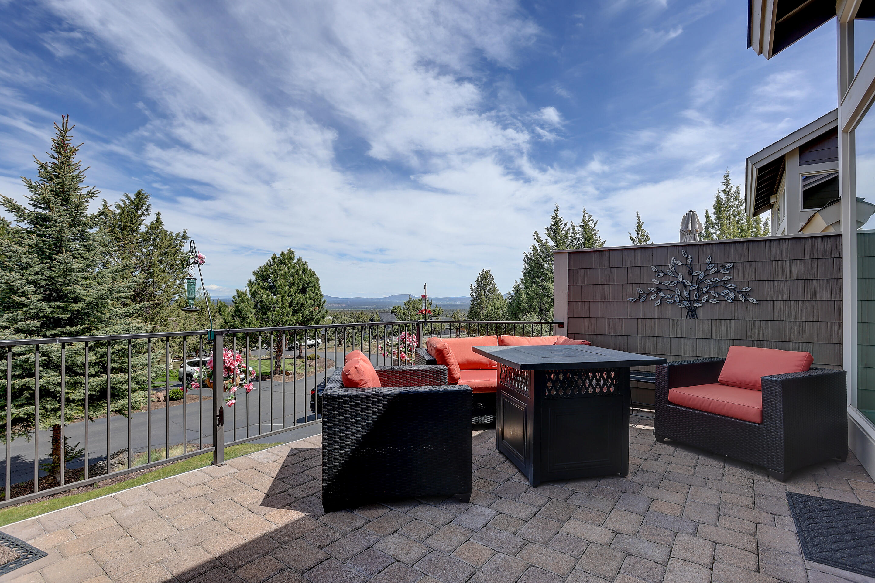 Spectacular TURNKEY Eagle Crest Townhome at the top of Creekside with luxury upgrade package.  Fabulous Views and Beautifully furnished.  Open concept floor plan with soaring ceilings and large paver deck.  The MBR suite and laundry are on the main level.  Upstairs are two additional bedrooms and a loft area.  This home has been impeccably maintained, with many improvements/upgrades, including all new appliances (with an induction oven and cookware), and a new water heater.  Three storage areas:  Front entrance, Deck and Below Deck.  Walk to pickle ball, workout facility and outdoor pool.  Eagle Crest is home to three 18-hole golf courses, three sports centers and miles of paved trails.  Enjoy indoor/outdoor pools, tennis court, pickle ball and basketball courts.