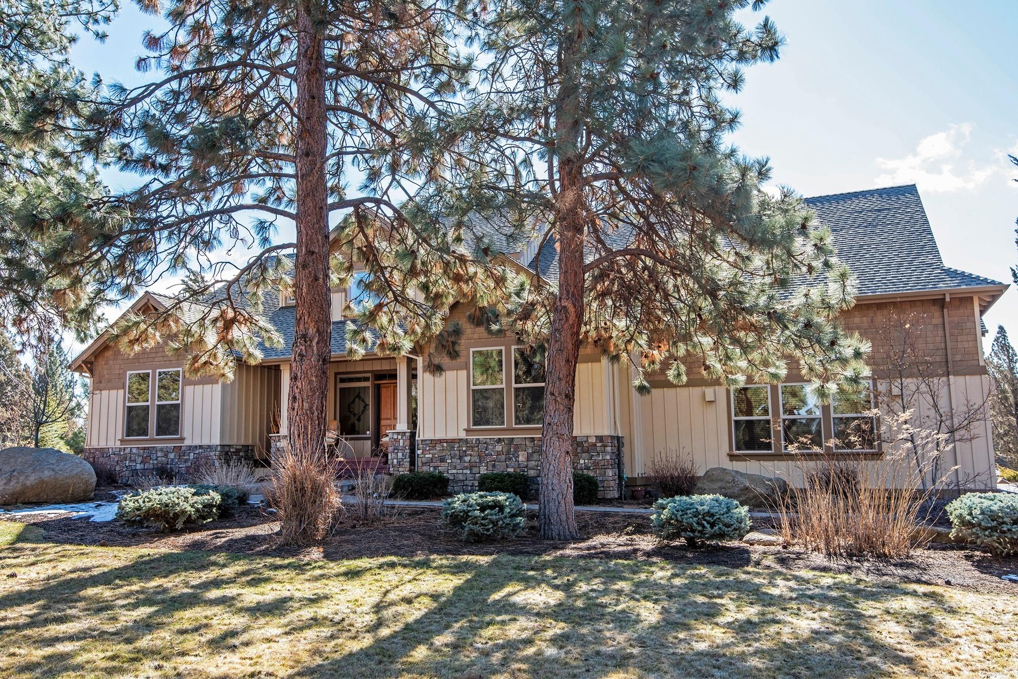 Golf course living at its finest! This beautiful Aspen Lakes home faces the 17th Fairway from the back and the 13th Green from the front. Rec center, swimming pool, tennis & sports cts nearby. This Craftsman home easily sleeps 12 people, perfect for family & friends. The Great Room boasts a towering vaulted Cedar ceiling w/ a Montana stone wood (Xtraordinaire) fireplace. Gourmet kitchen has SS appliances, Cherry cabinets, Granite counters & Breakfast Bar. Deck off Great Rm has a Pergola, w/a fireplace for ambience & an enclosure for a BBQ. Owner's bedroom has large walk in closet & bath has access to outside hot tub. Perfect for soaking after a day of skiing! Two more bedrooms downstairs, bathroom & 1/2 bath & large Laundry Rm w/sink & built in cabinets. Upstairs there are two possible bedrooms, a Craft room & Bathroom. New roof in 2017. 3 car garage w/ 9' X 11' RV door. Quality throughout: wood floors, clear Fir doors & trim & more!