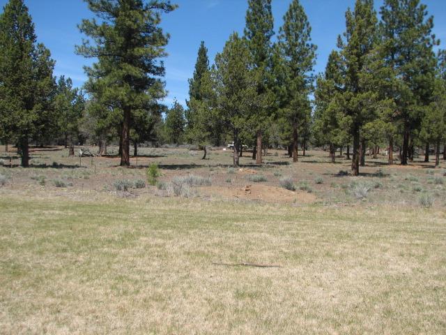 One of a very few waterfront homesites available in the Sisters area. This beautiful lot borders the Lake on the 11th fairway of the Aspen Lakes Golf Course. Lots of natural light and nicely treed.
