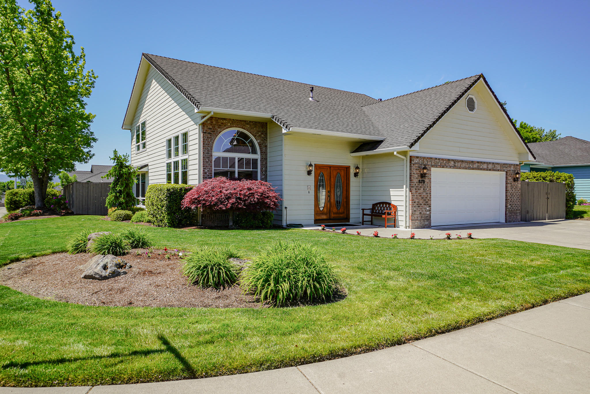 Absolutely beautiful, fantastic, stylish, must see home in highly desirable Central Point neighborhood. 3 bed, 2.5 bath 2,678 sq. ft. Home truly has it all; Main floor includes primary suite/bath with cultured marble tops and floor.  Kitchen has pantry, island, gas cooktop, built-in oven, built-in microwave. Living areas include vaulted ceilings, hardwood floors, gas fireplace. Upper floor includes family room, office, 2 bed, full bath. LARGE SPACIOUS ROOMS. Beautifully maintained landscaped yard, covered patio, inground sprinklers. HUGH RV parking area, water/power. So much storage, walk in attic.