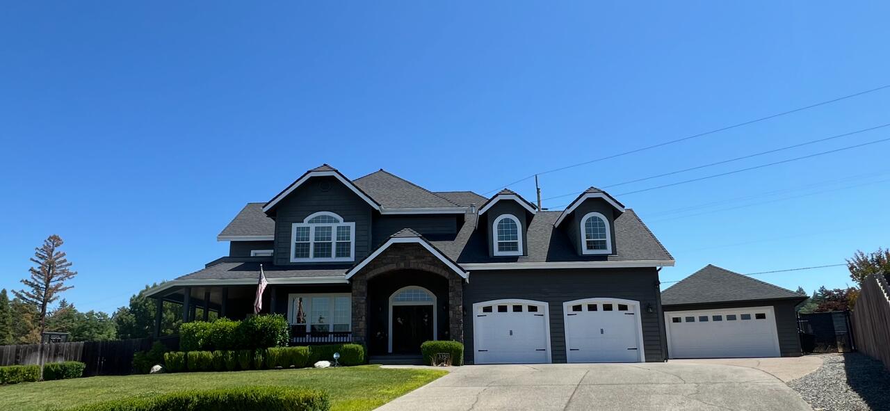 Welcome home to this stunning property loaded w/warmth, comfort & wide open spaces! Your new home comes equipped w/a huge Great Room open to both dining area & a well equipped kitchen complete w/breakfast counter, gas FP, engineered hardwood floors, front deck & 9' ceilings. Downstairs also features a formal dining area/office, walk-in pantry, laundry, guest room & full bath along w/access to the attached, oversized 2 car garage. Upstairs relax in the huge primary suite w/double doors, vaulted ceiling, gas FP, dual walk-in closets, deck & bath w/dual sinks, jacuzzi tub & dual head shower. 2 additional bedrooms, guest bath w/laundry chute, bonus room & hallway w/tons of storage make this an ideal home for those who appreciate the ability to spread out! Step out back into your own personal oasis equipped w/in-ground pool, hot tub, wrap around covered deck, patio, lawn & palm trees! Finally, on the side of the home you'll find a huge, gated parking area for RVs, 5th Wheels and toys