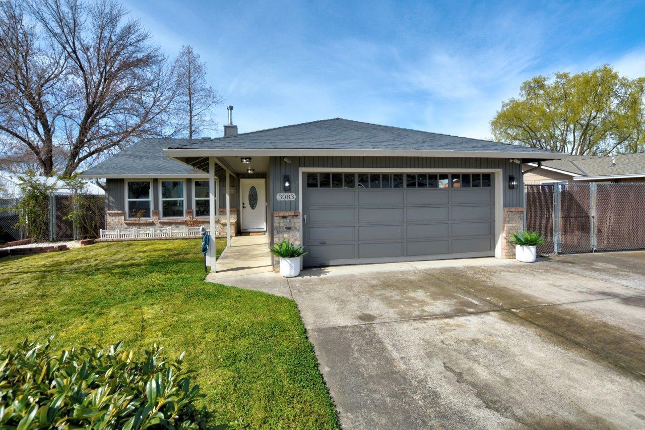 Generous 5bd/3ba, single level home on a quiet street, with easy access to town conveniences. Step into the vaulted & airy living room with wood stove. Updated & bright kitchen with island, leathered granite, tile backsplash, stainless appliances & soft close hardware. Newly installed data jacks for advanced networking, for those needing faster internet speed & complementing the smart home features such as the thermostat, dimmer switches & sprinkler controller. Each bathroom has modern fixtures, faucets, white cabinets & one new vanity. A second living area makes for a great entertaining space. Updated flooring throughout, newer paint, LED lights, modern fixtures & ceiling fans. Newer vinyl windows with new blinds. There is gated RV parking with full hook-ups. Fenced & landscaped backyard with covered back patio, hot tub, paths & relaxing gazebo. Plenty of storage in the 2 car garage along with 3 large storage sheds. A full package property and move-in ready!