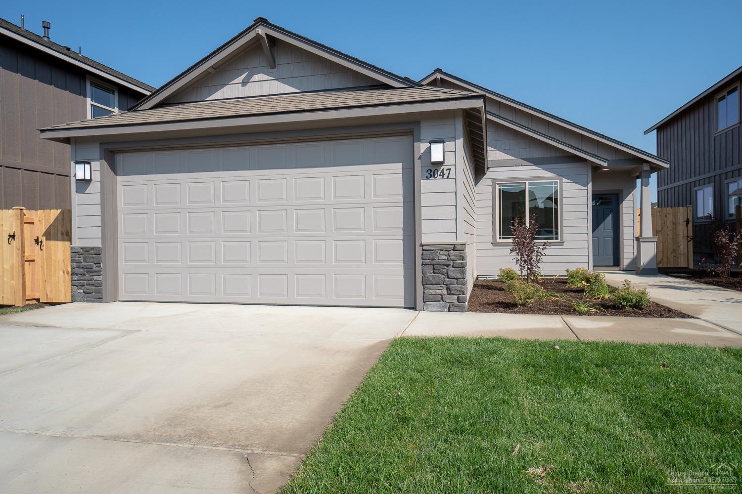Brand new home, completed in the next week! 3 br's, 2 baths, 1,464 sf w/tons of windows. Lg great room w/gas fireplace & stone surround, open to dining w/eating bar, Quartz ctrs, SS Energy Star appliances, lg pantry. Spacious br's, huge Mstr closet, tray style ceiling in Master, dbl sinks in baths. Forced air high eff. furnace, AC ready. Dbl garage w/front & back patios. Front landscaped w/sprinklers, 6'cedar fence. Photos are of model home. Model home @ 3095 NW Alder Pl open 12-5pm Thurs-Mon - COME SEE IT!