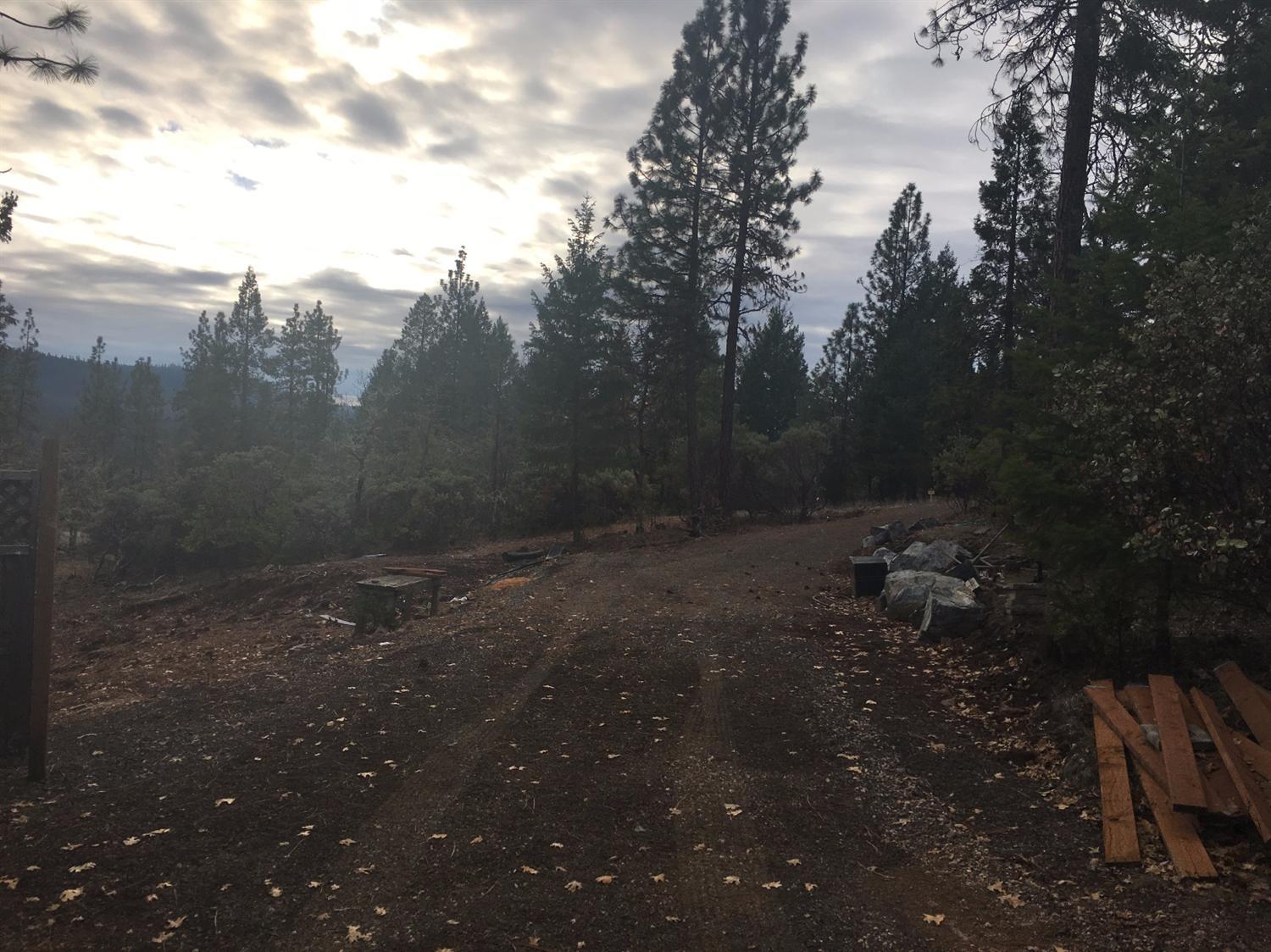 Beautiful building lot in Evergreen Meadows subdivision. This lot is one of the last lots available in the subdivision. With a 2 story home you should have a view of beautiful Lost Creek Lake. The current owner has made significant improvements to the property including getting water to the lot and preparing the site for building. There is a community water system that will provide clean water for a minimal annual fee.