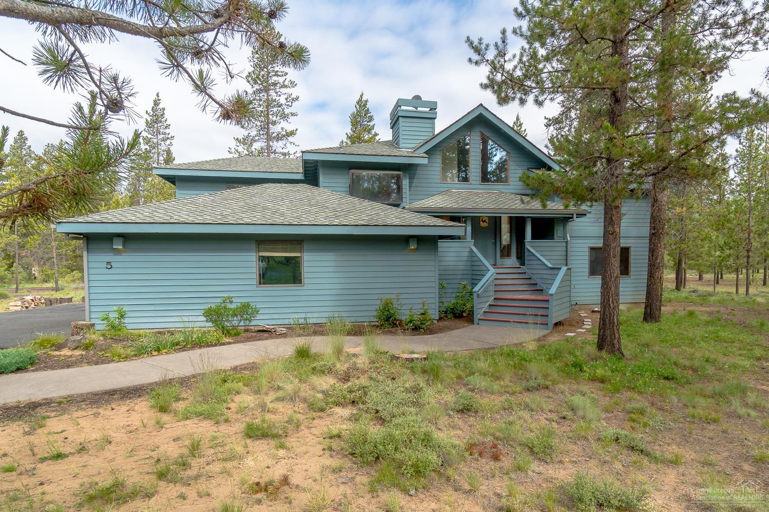 Great opportunity to own in the beautiful community of Sunriver! This home offers wood wrapped windows throughout, vaulted cedar ceilings, 2 gas fireplaces, laundry chute, a man-rated elevator, and much more. Having a master suite on each level and a wet bar downstairs makes this home perfect for family vacations. Only a short distance to SHARC and The Village, fun Sunriver living is just a bike ride away!