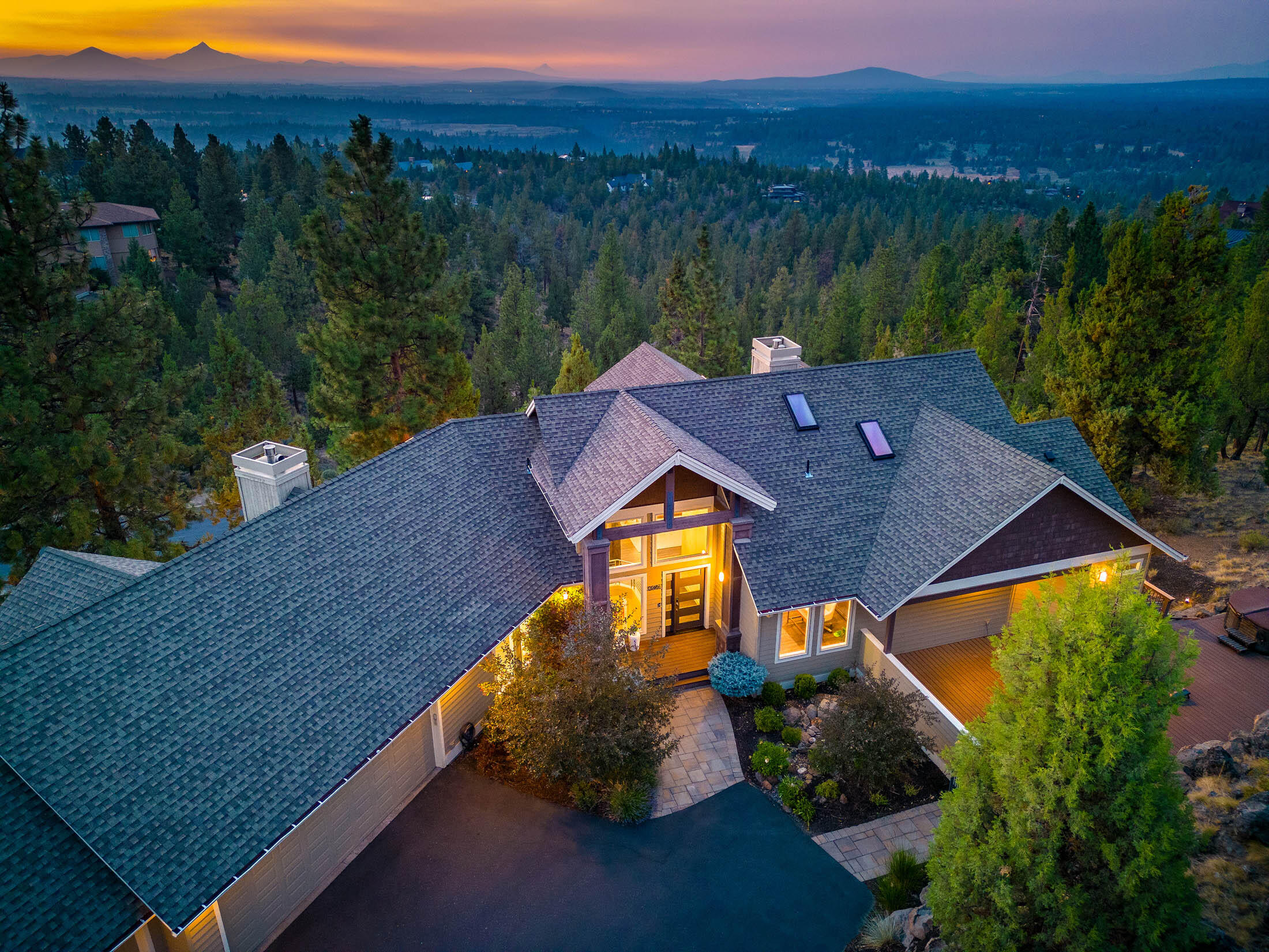 Indulge in Modern Luxury in One of Bend's Oldest & Most Prestigious Neighborhoods! Discover the epitome of contemporary living in this stunning home featuring 5 beds, 4.5 baths, 4,585 sq.ft., and 1.08 acres of land. You will be captivated by the perfect balance of style, w/ a masculine twist ,and timeless charm. The commanding rock fireplace adds character, yet it's the magnificent views of Mt. Jefferson that provide the ultimate backdrop for a truly luxurious living experience. Step into the open kitchen, boasting top-of-the-line commercial appliances and integrated smart features, that cater to culinary enthusiasts and modern living. The main-level primary suite features a walk-in closet that will make any fashionista smile. Relax and unwind in the hot tub or soak in the beauty of the surroundings from the spacious decks that showcase the stunning views. With a 3-car garage, you'll have ample space for all your toys and storage needs. Experience luxury living at its finest.