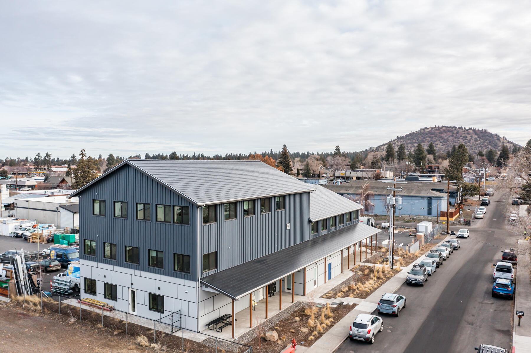 State-of-the-art industrial, office, and executive suites in a prime Bend location with mountain and city views. New construction and thoughtful design compatible for a number of different uses. Sunlight Solar is currently occupying a portion of the building and the rest is executive office spaces with a common kitchen, breakroom, and restrooms. Remarkably energy-efficient with passive solar design and cutting edge green equipment, including Tesla Solar Roof tiles. Central location within Bend Central District which offers a vibrant community of established and upcoming businesses and amenities. A future pedestrian bridge will connect the area directly to Downtown.