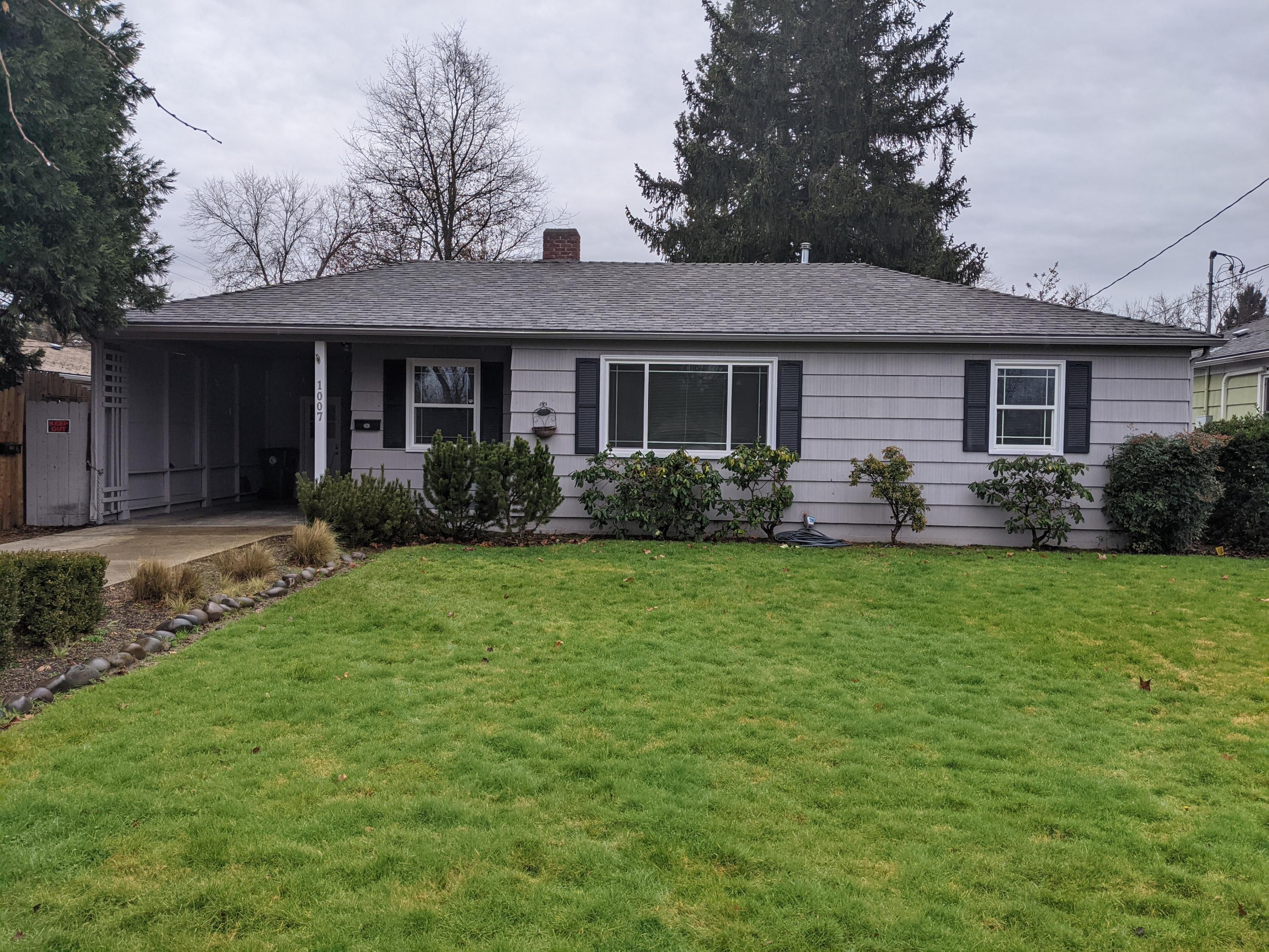 This home is move in ready.   Front home features two full bedrooms and one full bathroom.  There is a fireplace in the living room with natural light flowing in.  New paint and flooring.  Central air and heat.  The back home is a studio with a full kitchen and full bathroom with 406 sq. ft of living space.  POSSIBLE TWO FAMILY SET UP!
