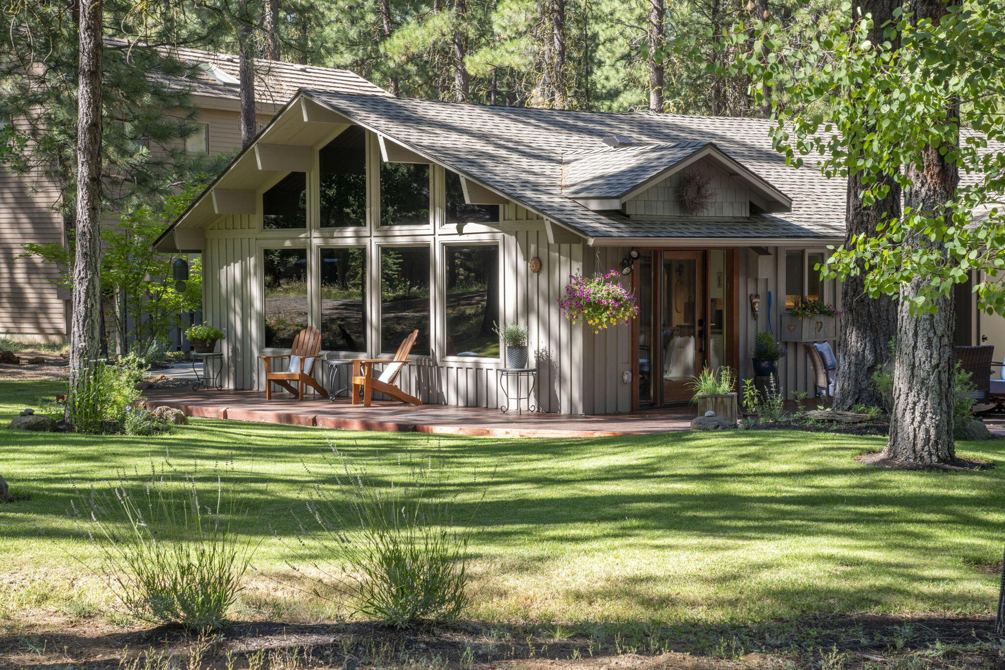 This charming Black Butte Ranch home, expertly remodeled in 2022, is ideally situated near Paulina Pool & Robert's Pub. Envision hosting a summer soirée on the deck, surrounded by a beautifully manicured lawn & flower beds. The meticulous attention to detail is apparent throughout the home, beginning with the country-style gourmet kitchen to the light-filled & spacious great room. The generously sized primary bedroom suite features a private door leading to the patio and a cozy office nook. The luxurious primary bath boasts heated porcelain tile floors, a large walk-in shower, a soaking tub, double sinks, & custom cabinetry. Off the hall is a bedroom/office in addition to a bath, and a second bedroom/guest suite with a bath. Unwind in the hot tub under the stars with family and friends. Amenities include: 2 award-winning golf courses, bike/walking trails, horseback riding, swimming pools, tennis & pickleball cts, restaurants, outdoor music & more. It is furnished & move in ready!