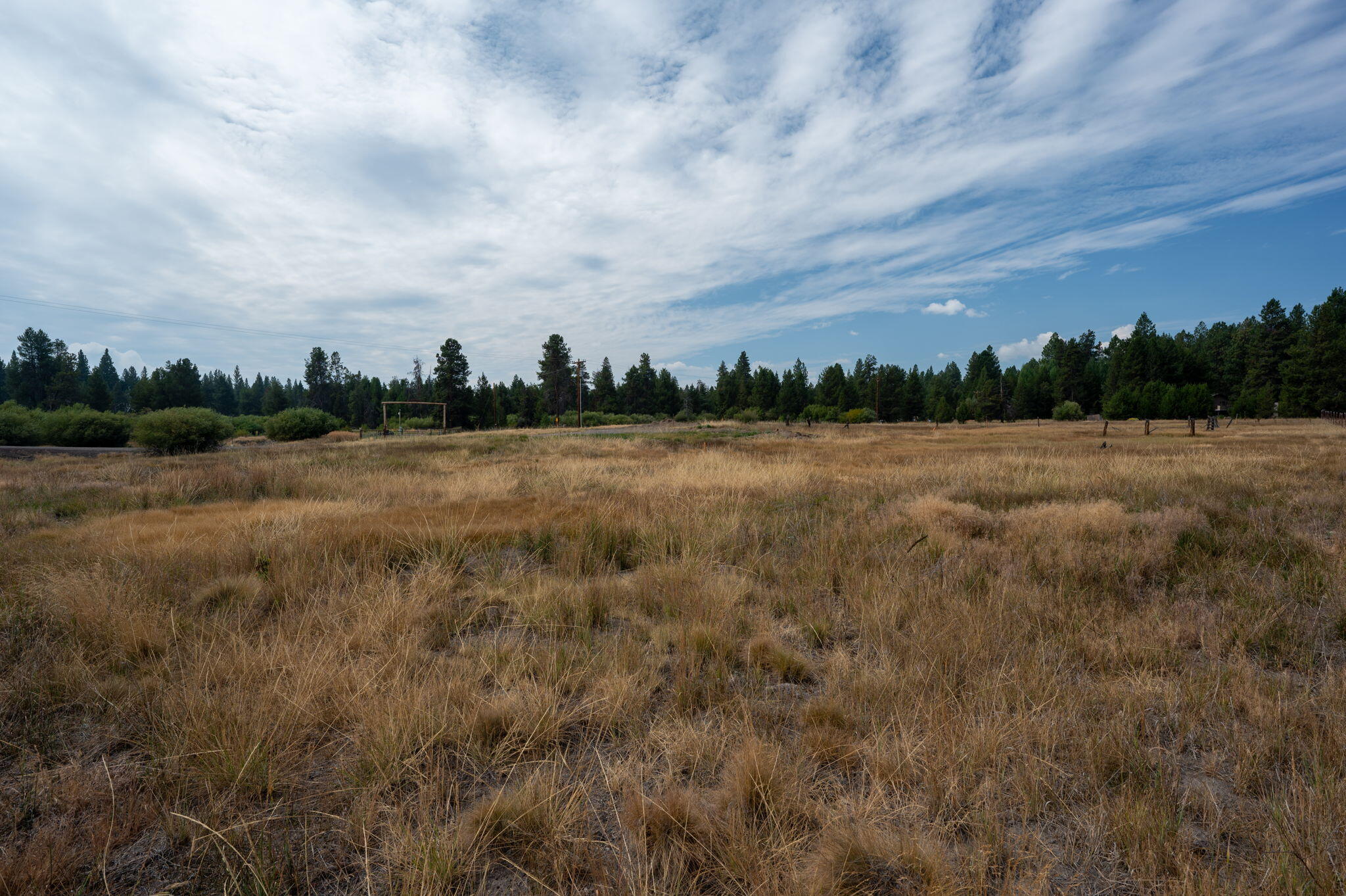 Beautiful 1/3 acre parcel ready for your dream home! Easy access and so many possibilities!  This coveted corner lot near the beautiful Deschutes River. With river access just across the street! 
This lot is private and full of potential. Owners in the area have created parklike settings and this one will be amazing with your vision! Close to the highway 97 corridor, local snowpark nearby and just off a beautiful Oregon Scenic Byway, you can enjoy a full time residence, part time vacation home or even use as a recreational property with full hook ups! Your possibilities could be endless here. Buyer to do all due diligence on land use approvals. Owner carry is not an option