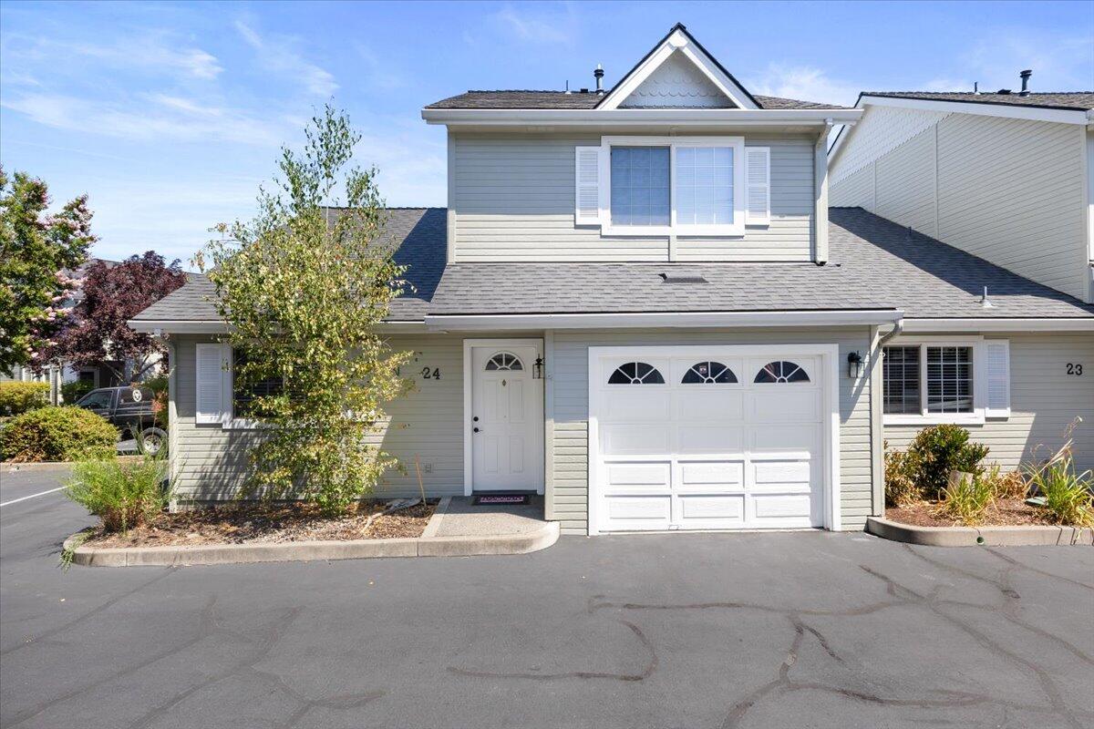 Brand New HVAC! Welcome to your dream townhouse in East Medford! This charming 3 bedroom, 2 bathroom gem offers the perfect blend of comfort and convenience. Enjoy peaceful living in a quiet, family-friendly community while still being close to all essential amenities. The inviting open floor plan features a spacious living area with plenty of natural light, ideal for both relaxing and entertaining. The open kitchen includes modern appliances and ample storage. The master suite is on the main level and is complete with a private bathroom and generous closet space. Outside, you'll find a low-maintenance patio perfect for enjoying your morning coffee or hosting a weekend BBQ. Exterior maintenance and landscaping is covered by the HOA, as well as a beautiful community pool.