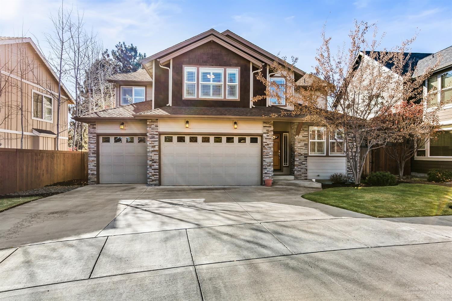 Quality home in desirable, well-maintained SE neighborhood, nestled among old-growth trees. Quick access to the highway as well as many other amenities puts this property in a quintessential Central Oregon location. This one-owner, impeccably maintained second home has been lightly lived-in and remains in like-new condition! Open floor plan allows for the perfect flow between the living and dining areas-including outdoor access to the patio and fully fenced, spacious, & landscaped back yard-with a bedroom, that could be also be used as an office, on the main level. Upstairs offers a large bonus/loft space that is ideal for a second living space or entertainment area. Incredible master suite includes vaulted ceilings, massive walk-in closet, double vanity, and luxurious soaking tub. No upgrades or features were overlooked- from the stunning exterior stonework and over sized 3-car garage to the generously-sized bedrooms and granite kitchen counter tops. Truly an impressive property!