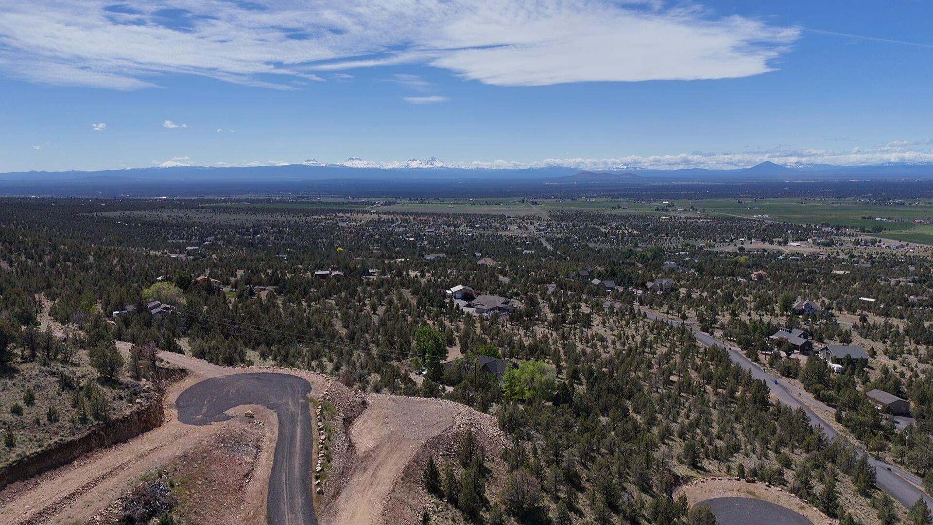 This exceptional lot in Powell Butte isn't just a place to build—it's the foundation for a truly one-of-a-kind home. Perched nearly 200 feet above the road, the homesite offers unmatched privacy and panoramic views stretching from Pilot Butte to the Ochoco National Forest. You'll experience the full splendor of Central Oregon's natural beauty, right from your doorstep.

The lot comes ready with a completed driveway, power, and Avion water already to the site. Plus, a private easement provides direct access to public lands just south of the property—perfect for adventure and exploration.

Ready to start your forever home? Contact us today to walk the land and take in the view.