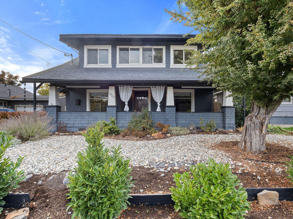 Step back in time to this 1926 built home. This charming 3 bedroom 2 bath home offers vintage character with carefully thought out updates. From the moment you arrive you will notice the timeless curb appeal, classic architectural details, a welcoming front porch, and mature landscaping that sets the stage for your dream home. Inside, the home features original touches like hardwood floors, period trim, and gorgeous built-ins. The kitchen offers updated cabinets and appliances with plenty of storage and natural light. The spacious living and dining areas create a warm, inviting atmosphere ideal for gatherings or quiet evenings at home. Upstairs provides a peaceful retreat with its own bath, two bedrooms and a bonus room perfect for your guests, home office, or creative space. Step outside to a cozy backyard perfect for morning coffee, or gardening in your own little slice of paradise. With nearly a century of character this home offers a rare opportunity to own a piece of history.