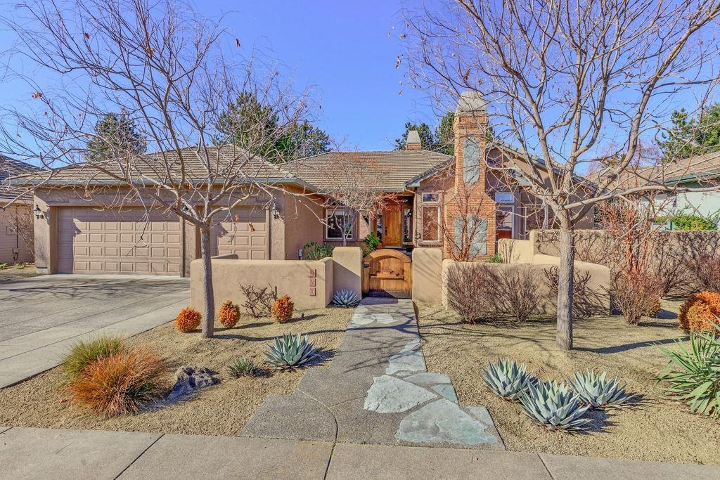 DON'T MISS this Stunning, Pagnini built single-level home with its enchanting landscaped grounds! You'll feel like you're living in your own serene resort but with the convenience of a sought after East Medford neighborhood close to golf, shopping, medical & star restaurants. 3 bed, 2 bath w/high, beamed ceilings; numerous windows & frdrs; hardwood, terra-cotta & carpeted flooring;open floorplan w/large living areas, 2 fireplaces & amazing built-ins & amenities w/exquisite detail inside & out. Gourmet kitchen featuring a large center island w/gas cooking, eating bar & windowed nook; granite countertops, tile backsplash & terrific cabinet & drawer storage. Enjoy a warm, inviting great room + a cozy den/office. The luxurious master suite boasts vaulted ceiling, dual sink vanity, shower, jetted tub, walk-in closet & a sitting or desk area w/frdrs to the gorgeous, private mature SW backyard oasis w/water feature, etc. Speakers inside & out add to the ambiance & your personal enjoyment!