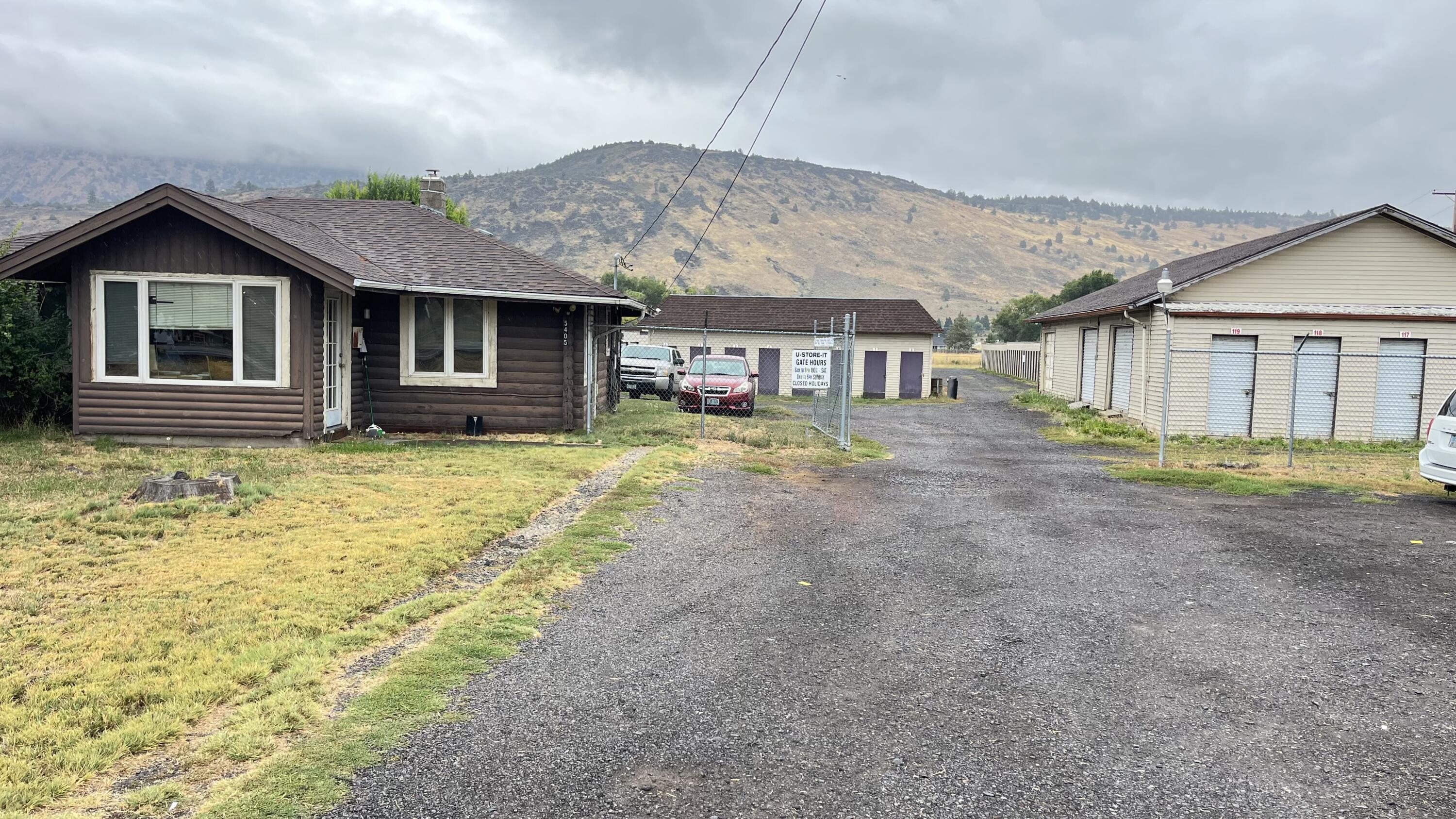 Own a long standing storage unit right off of Hwy 97 N. Cabin/office (905 sqft) is located at the
front of the property. It has 2 bedrooms and 1 bath with an new pellet stove. Storage units range
from 5x5-17x30. At the end of the 1.96 acre property is another tax lot of 1 acre. This lot has been
used for boat and RV storage and another income generating opportunity. Property has the potential to
become a solid investment with proper updating and management. Schedule a showing today and find out
what opportunities await.