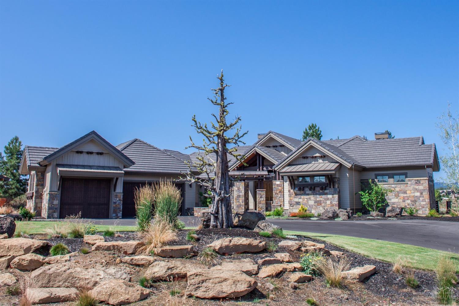 Stunning Cascade views welcome you to this award winning, single level home. 20 ft vaulted ceiling in the great rm with woodburning fp, natural stone, 5.1 surround, knotty alder, maple and walnut accents through out, stunning gourmet kitchen with slab granite and quartz, 2 dishwashers,2 wine fridges, custom cabinetry. Master has mt views, fp, huge custom walk-in closet, silver travertine tile, oversized 3 car garage, beautiful courtyard and covered patio for entertaining.