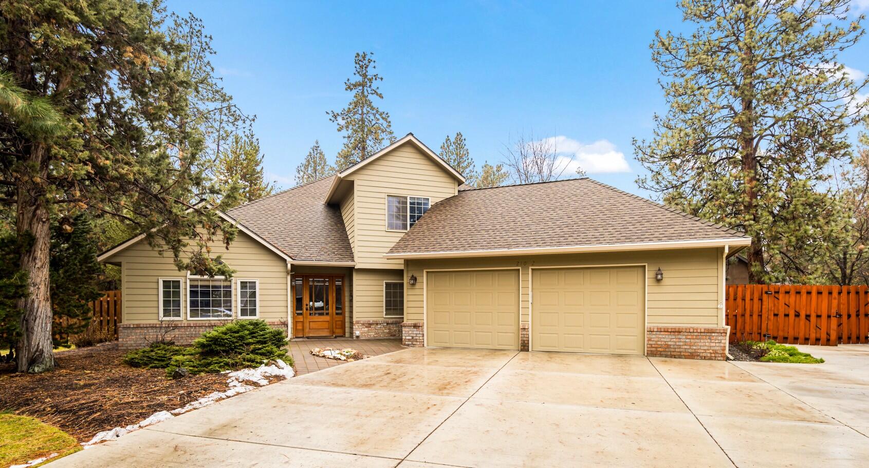 Location, Location, Location! Experience peace and tranquility in the desirable Orion Estates. This beautifully updated home offers 3 bedrooms, 3 full bathrooms, a remodeled kitchen with slab counters and stainless-steel appliances, vaulted ceilings in the living room, a cozy family room with a gas fireplace, and an office/den that can double as a 4th bedroom. Hardwood floors add warmth and charm throughout, with radiant floor heating throughout the main house. The nearly ½-acre lot is an entertainer's dream, featuring a private backyard oasis with a water feature, raised garden beds, an herb garden wall, and a hot tub. Additional highlights include covered RV parking with hook-ups, a pickleball area, and a shop with a permitted ADU for guests. Both the main house and ADU are connected to city sewer. While offering privacy and a country-like feel, this exceptional property is just moments from all that Bend has to offer. Don't miss the opportunity to call this gem home!