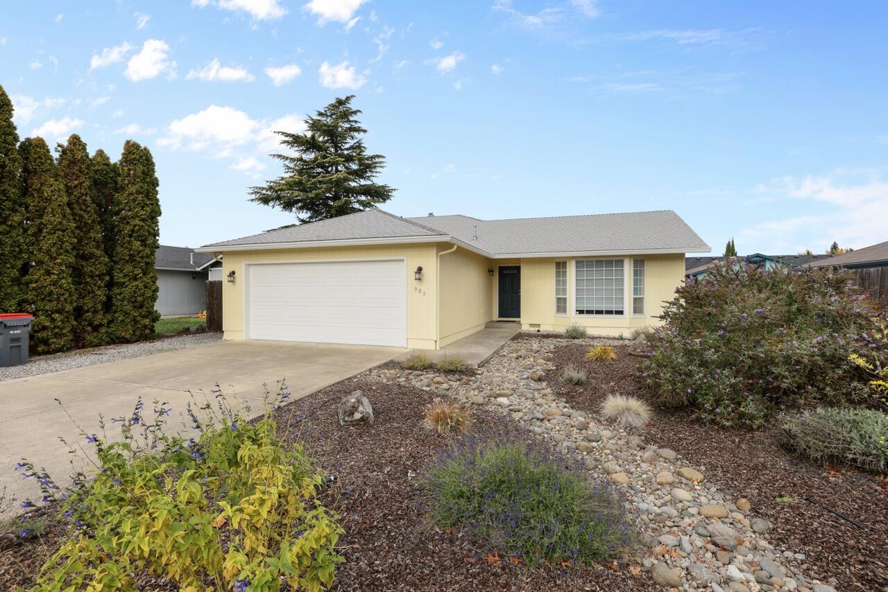This inviting 3 bed, 2 bath home is nestled in a peaceful SW Medford cul-de-sac, offering comfort and convenience in all the right places. Thoughtfully updated with fresh interior & exterior paint, and new carpet. The home has a clean and welcoming feel from the moment you step inside. The vaulted ceilings elevate the living space, while the newer landscaping outside is both attractive and easy to maintain. A well balanced floor plan and inviting surroundings make this home a great fit for everyday living.