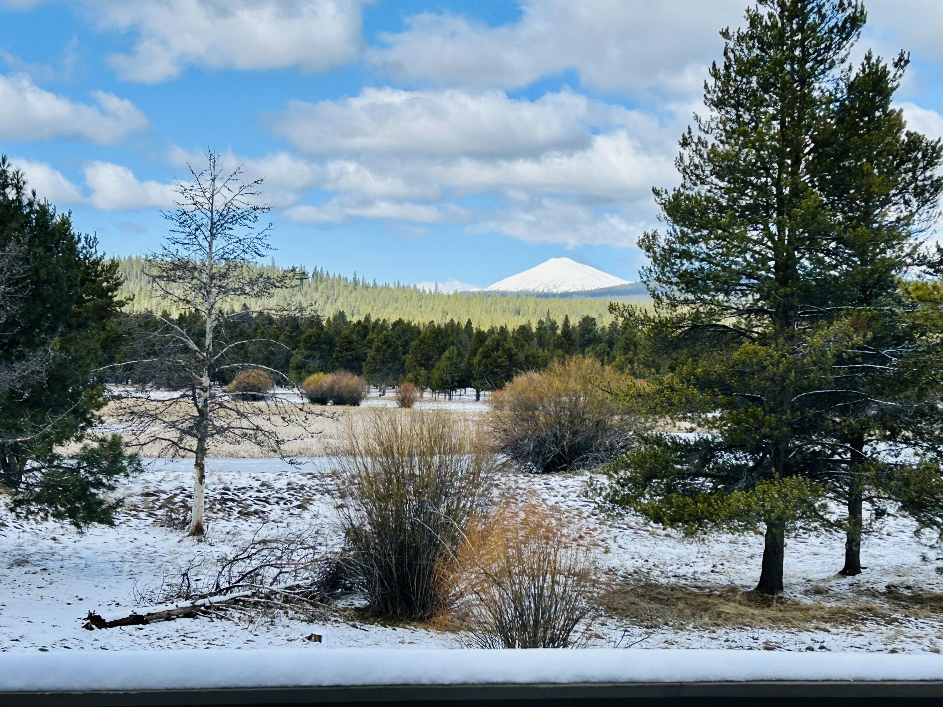 Welcome to your Sunriver dream home! This wonderfully private lot on the serene Sun River boasts unparalleled meadow views overlooking the Deschutes River & Mt. Bachelor. Natural light floods the vaulted great room, highlighting the tongue and groove ceilings and solid beam construction. An entertainer's kitchen with butler's pantry make hosting a breeze, while you'll never tire of the views.

Enjoy outdoor living on the expansive deck, indulge in the private hot tub off the family room, or retire to the main floor primary suite, all while taking in the picturesque surroundings. In addition to the well-appointed 4 bedrooms & generously sized family room, you'll find two utility rooms and a three-car garage. 

Offered with turnkey furnishings & impressive rental history, 6 Sisters Lane is the perfect Sunriver getaway, whether you plan to share with guests or keep all to yourself. Don't miss the opportunity to own this beautiful property that will make every day feel like a vacation