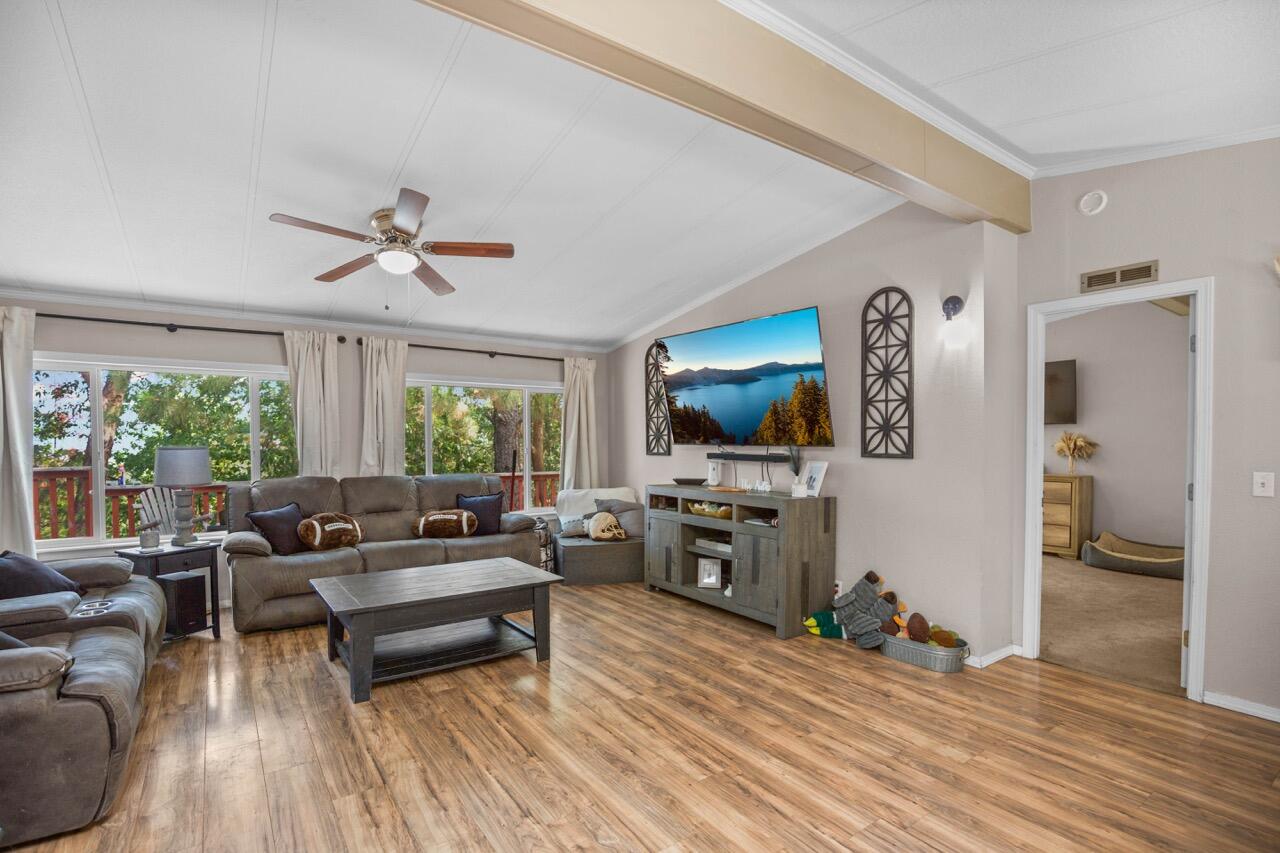 Updated Home on Nearly 10 Acres with Valley Views, with recent road work to make for a smooth drive home!

Welcome to 300 Arrowhead Pass in Jacksonville—a rare opportunity to own an updated 3-bedroom, 2-bath manufactured home on 9.87 acres with sweeping valley views. This property offers the perfect blend of comfort, functionality, and wide-open space. The home features 1,512 sq ft of living space with thoughtful updates throughout. Outside, you'll find a 1,500 sq ft shop/dirt floor—ideal for hobbies, storage, or business use—plus RV hookups for convenience. A charming she shed on a foundation provides the perfect retreat, studio, or workspace. With nearly 10 acres to call your own, you'll enjoy privacy, stunning vistas, and plenty of room to live the lifestyle you've been dreaming of.  Possible owner carry.