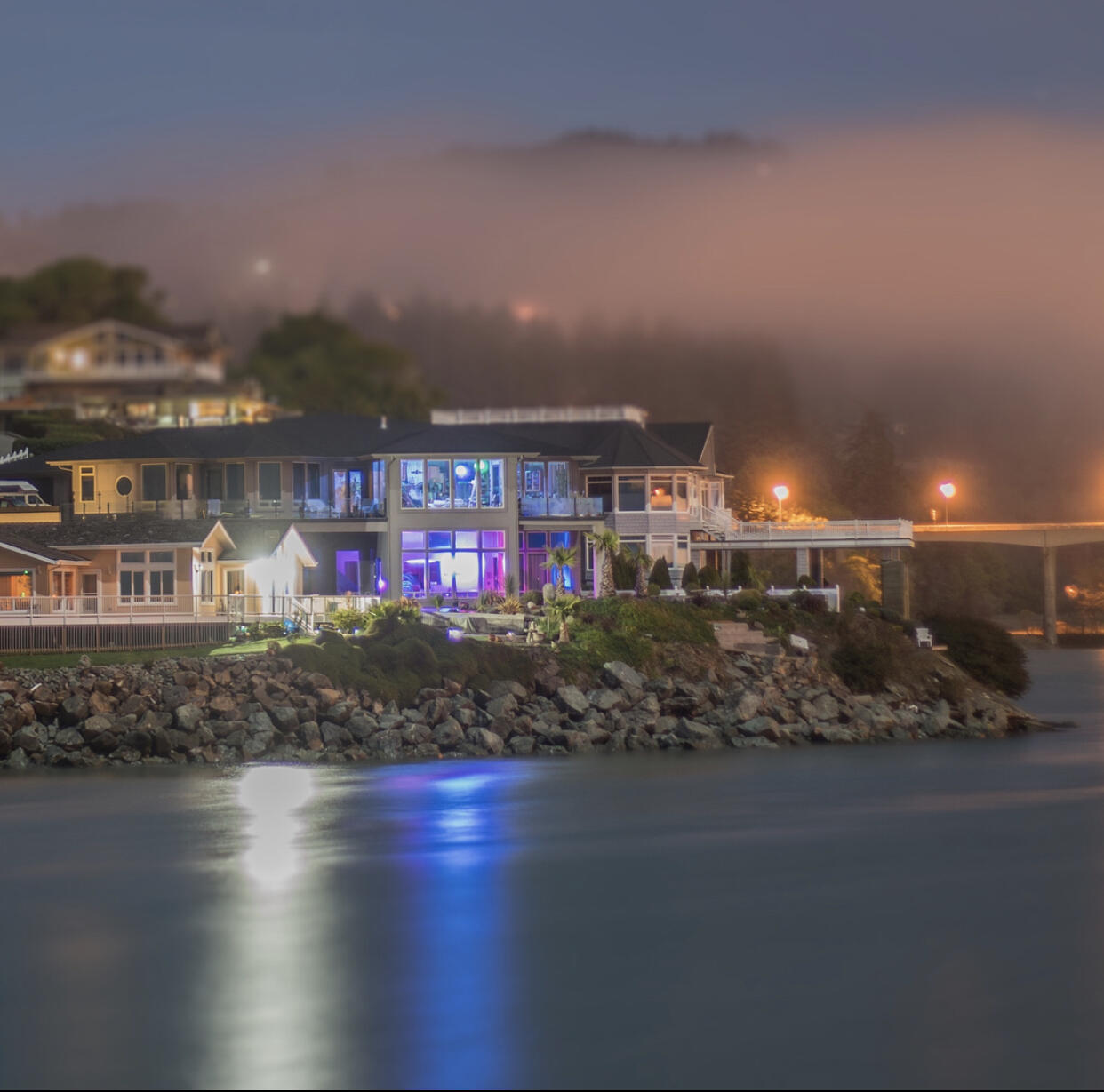 Experience everything Brookings has to offer by living life on the mouth of the pristine Chetco River. This Magical location offers so many amenities. River and beach access from this beautifully landscaped beach-scape yard. Jump in the river or ocean to paddle board, surf, fish, etc. Incredible sea life/boat activity all day long. Enjoy the amazing sun rises over the mountains from either of the tow decks on the upper level. Add your finishing touches to complete this work of art. Living in this home is like living in natures atrium, one of kind and built with love.