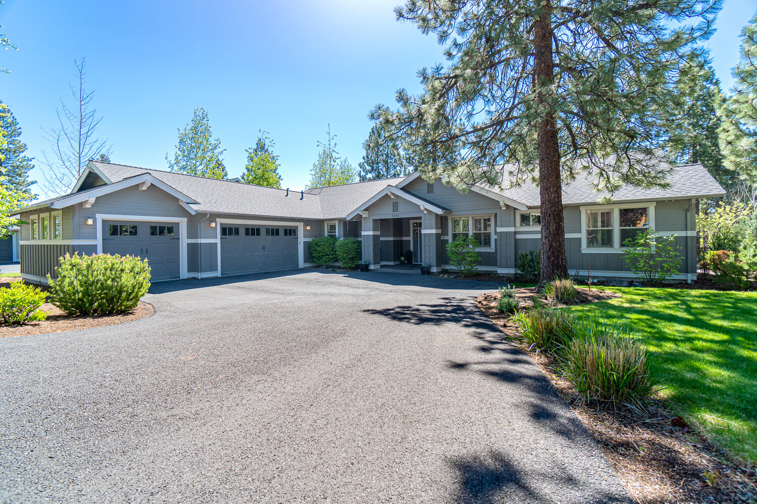 Inviting single-story Craftsman style home with 936/sf 3-car garage, located in NW Bend's Shevlin Ridge. This energy-efficient Earth Advantage Silver-rated home
features a private primary bedroom w/spa-like bath, plus a secondary jr. suite, and a 3rd guest bedroom and bath. An open, vaulted greatroom and fabulous kitchen provide a place
to gather and the perfect place for entertaining. Additional features include: livingroom gas fireplace with built-in bookshelves, separate den/office with built-ins, designated
laundry room, mudroom area off garage, backyard  access from dining area and primary bedroom, windows with louvered shutters, 2 Zone HVAC, and 30 AMP power in
garage for RV. Outside you'll find a full-length patio with gas fire pit, lots of beautiful mature trees & landscaped front & back yards. The large 0.32 acre corner lot
provides extra privacy and elbow room. Located in an established neighborhood. Don't wait for a home to be built - this one is perfect and waiting for you!